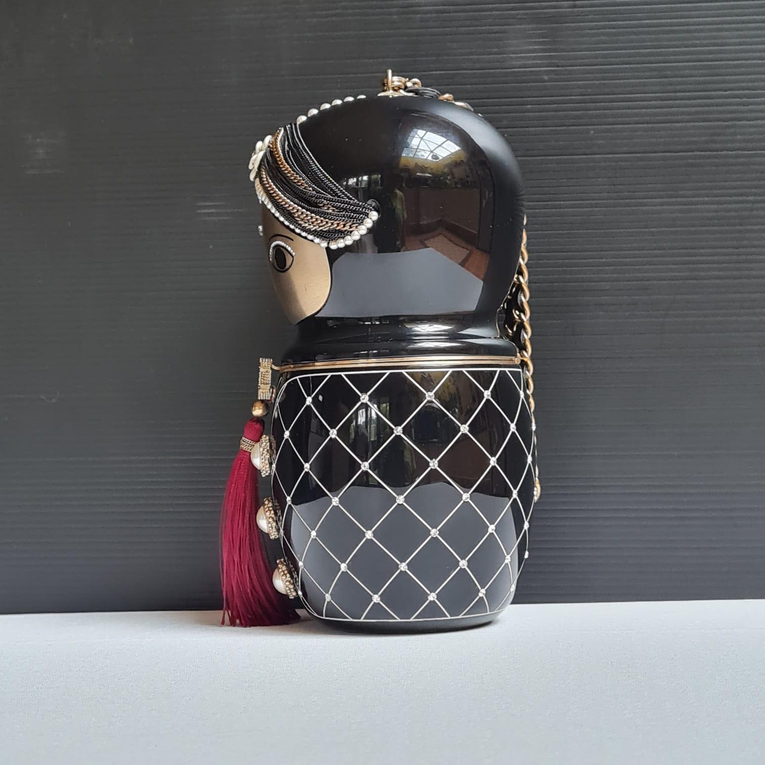 chanel doll clutch bag