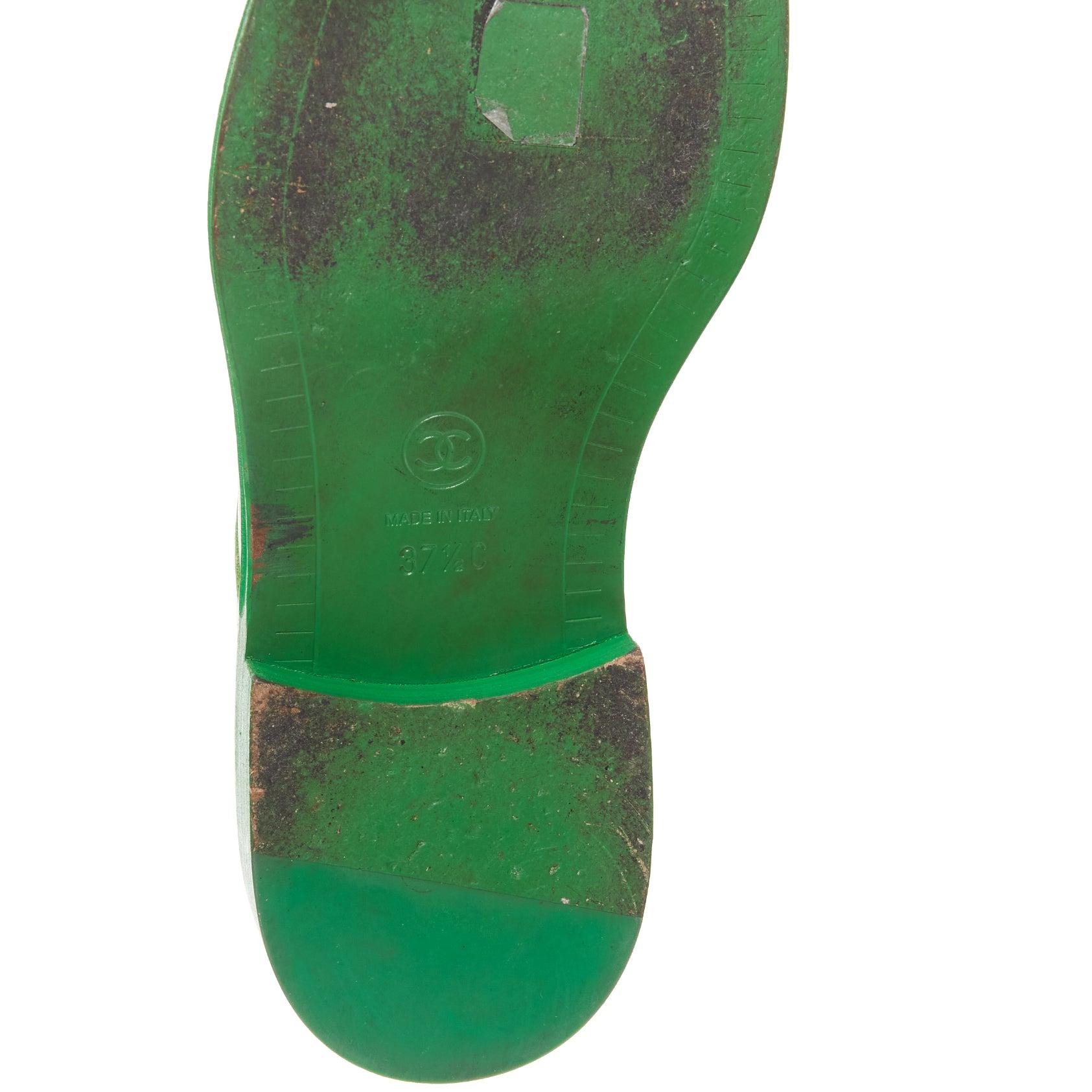 rare CHANEL PHARRELL green leather logo embellished slip on loafer flats EU37.5 For Sale 6