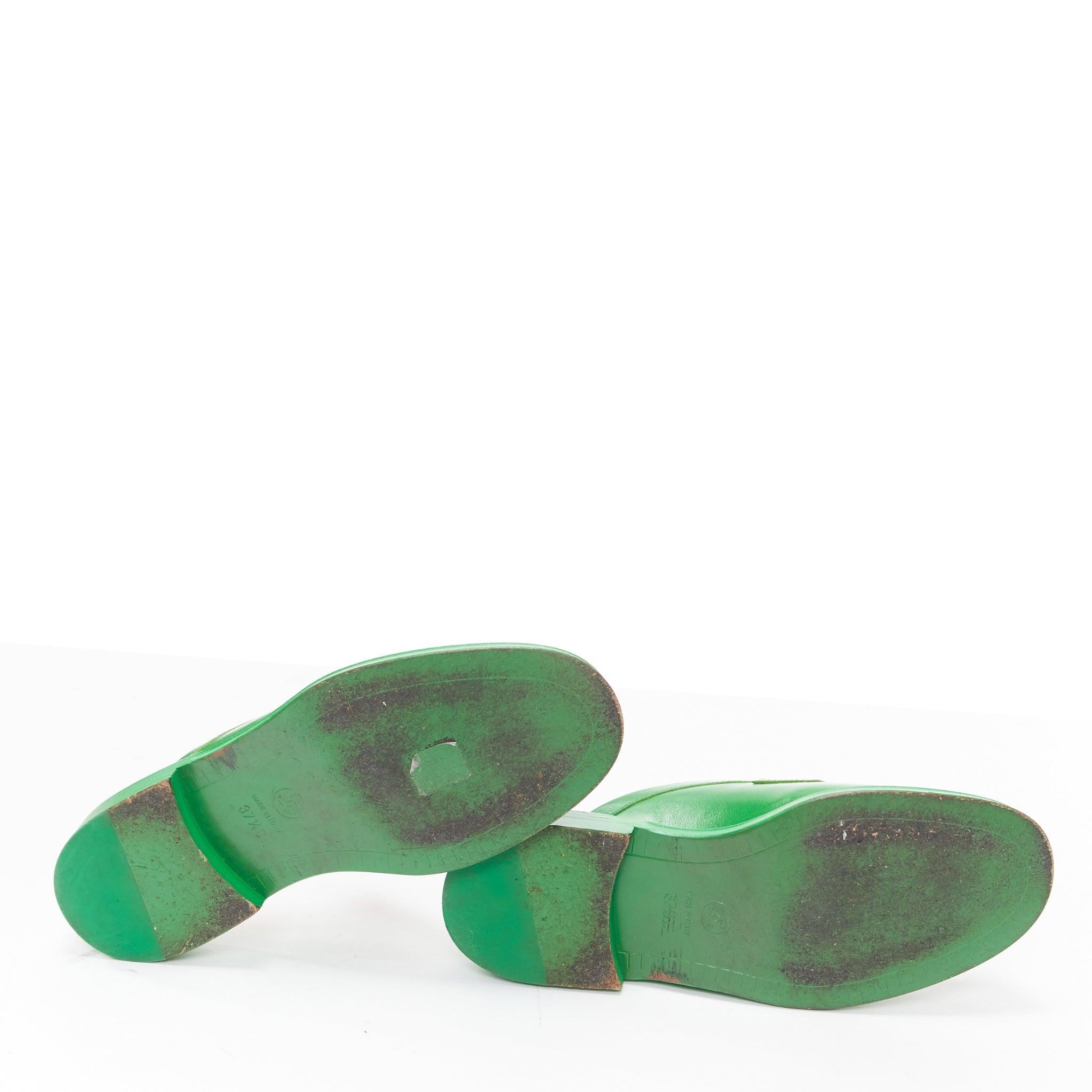rare CHANEL PHARRELL green leather logo embellished slip on loafer flats EU37.5 For Sale 7