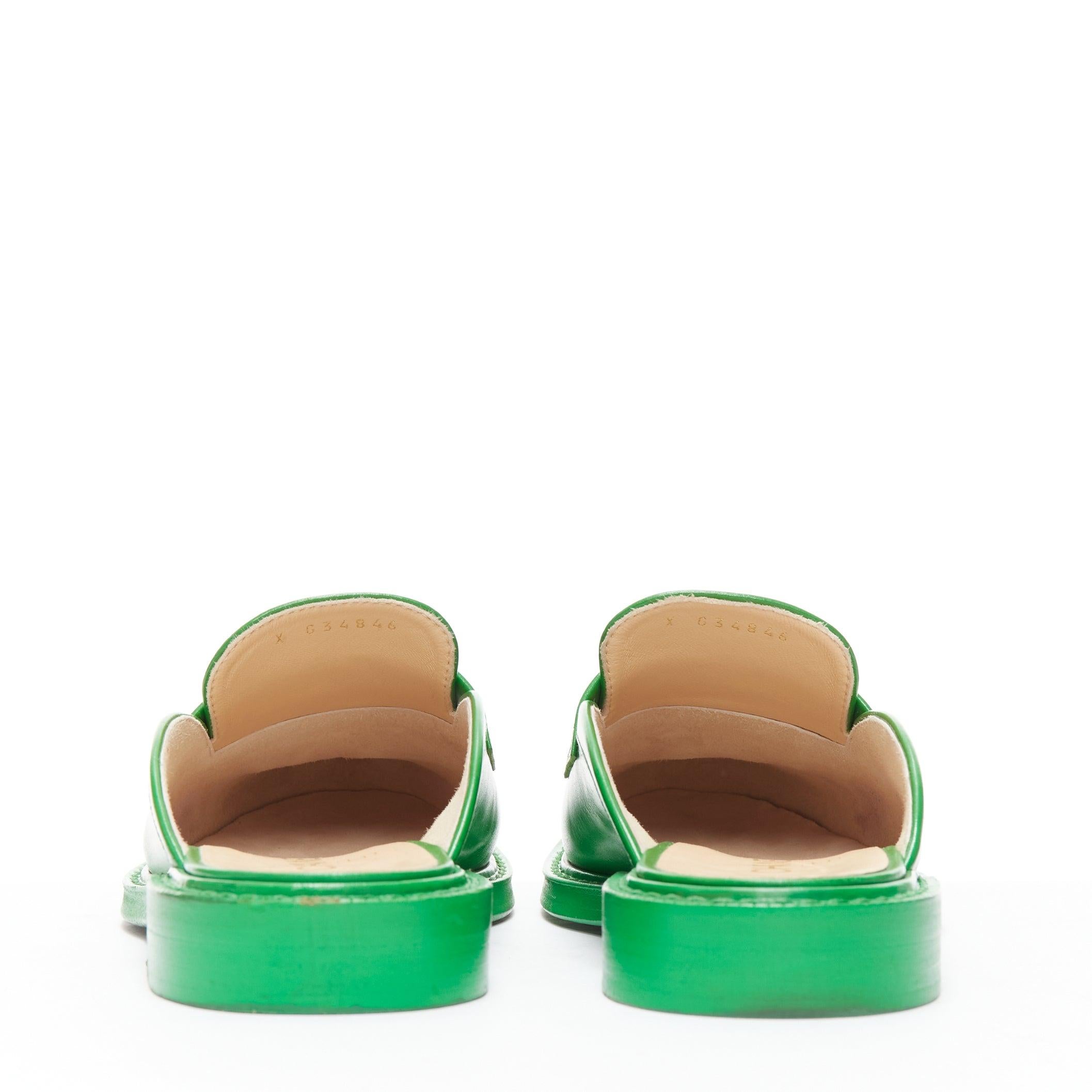 rare CHANEL PHARRELL green leather logo embellished slip on loafer flats EU37.5 For Sale 1
