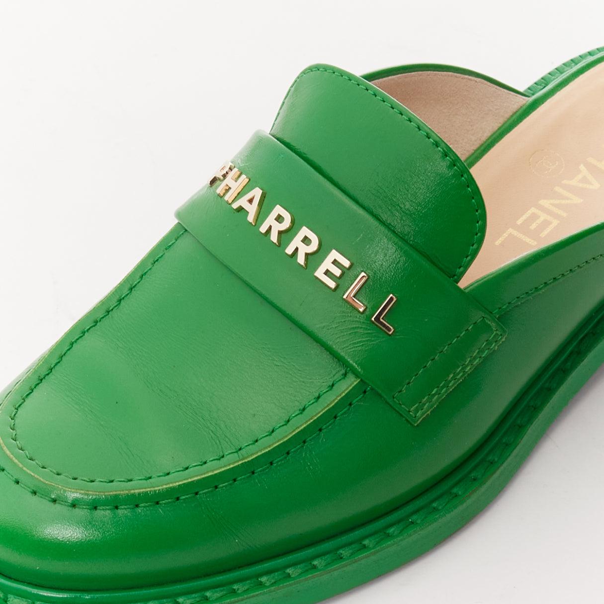 rare CHANEL PHARRELL green leather logo embellished slip on loafer flats EU37.5 For Sale 3