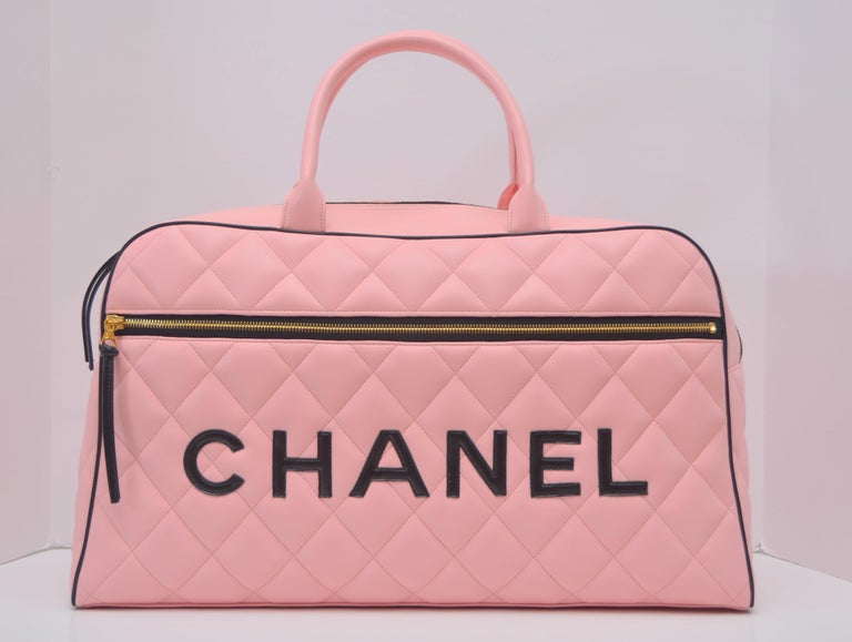 Chanel Rare Pink Vintage 1995 Weekend Duffel Overnight Duffle Tote
This kind of vintage bags are impossible to find in this new with tags condition and 
color in person  is very like Sakura Pink.
Please see images to determine the color, sometimes