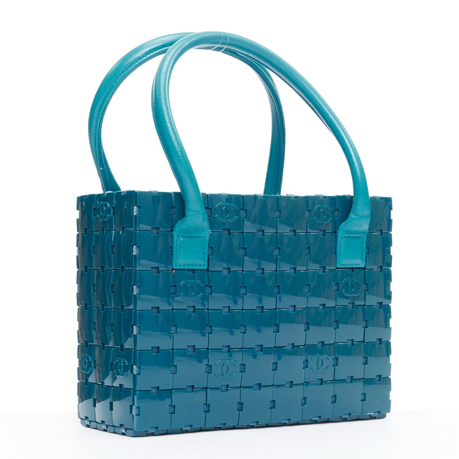 rare CHANEL Puzzle blue plastic CC chip leather stitch tote bag
Reference: TGAS/E00380
Brand: Chanel
Designer: Karl Lagerfeld
Material: Leather, Acrylic
Color: Blue
Pattern: Solid
Lining: Blue Leather
Extra Details: Blue acrylic puzzle pieces with