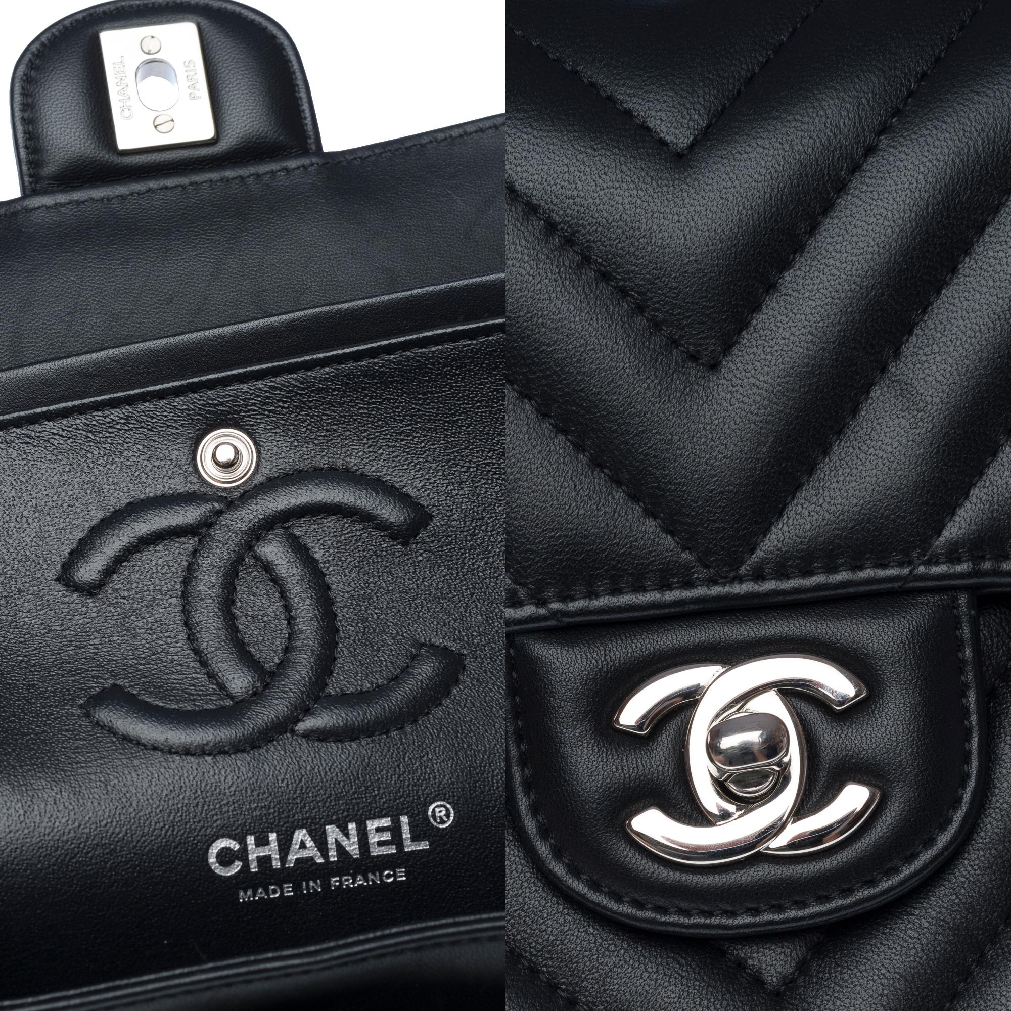 Rare Chanel Timeless 23 shoulder bag in black chevrons quilted lambskin , PHW For Sale 1