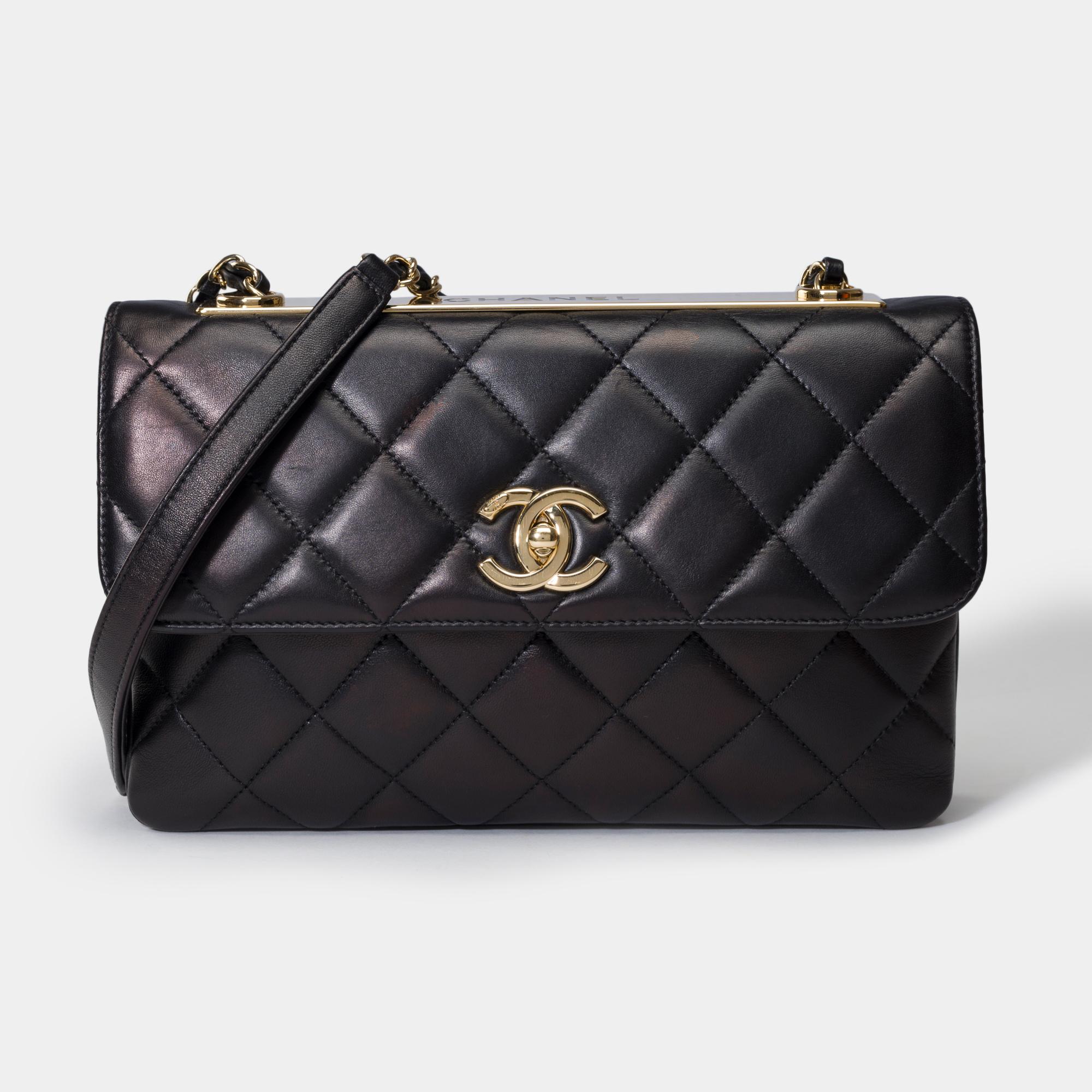 Superb​ ​Chanel​ ​Timeless/Classique​ ​Coco​ ​Trendy​ ​CC​ ​shoulder​ ​bag​ ​in​ ​black​ ​quilted​ ​leather,​ ​gold​ ​metal​ ​trim,​ ​a​ ​gold​ ​metal​ ​chain​ ​handle​ ​interlaced​ ​with​ ​black​ ​leather​ ​for​ ​a​ ​hand​ ​or​ ​shoulder

A​