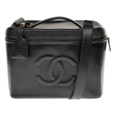 Rare Chanel Vanity Case in Caviar black leather with strap , gold hardware 