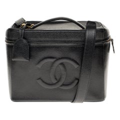 Rare Vanity Case de Chanel en cuir noir caviar avec bracelet:: matériel doré