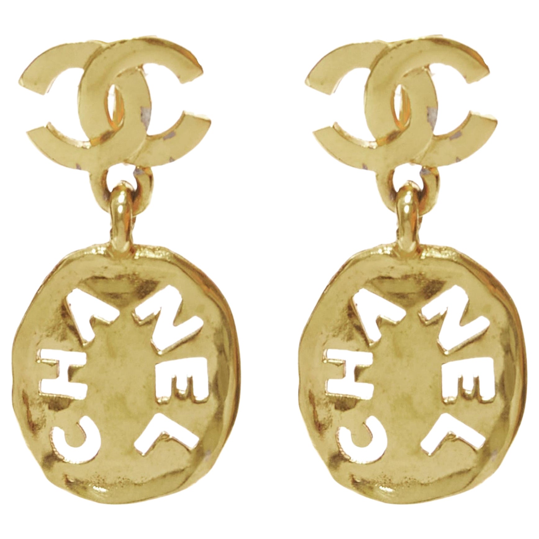 rare CHANEL Vintage gold CC logo cut out hammered coin clip on earrings