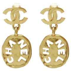 rare CHANEL Vintage gold CC logo cut out hammered coin clip on earrings