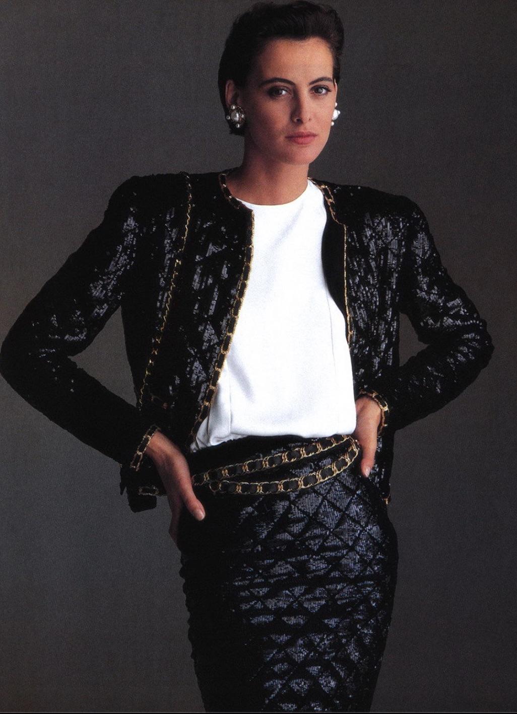The iconic black sequin jacket from Chanel Spring/Summer 1987 collection is a true vintage gem. The open front boxy cut gives it a timeless elegance, while the shiny black sequins and signature quilted pattern make it unique and striking. The Haute