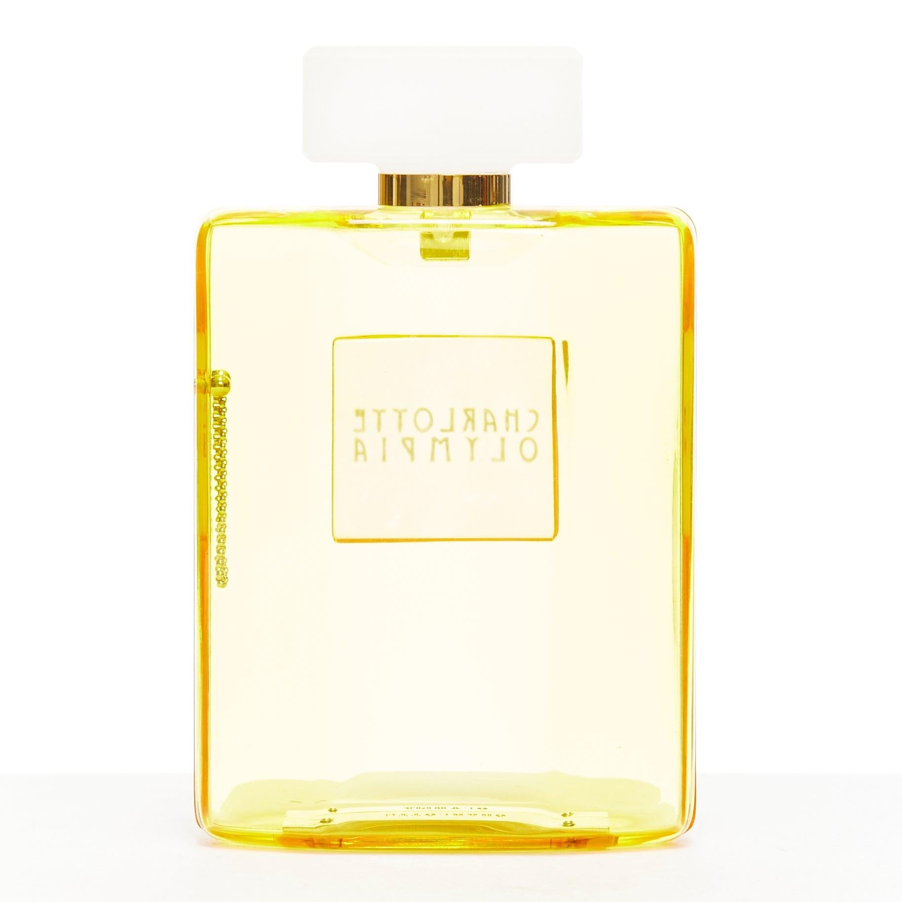CHARLOTTE OLYMPIA rare pochette à bouteilles de parfum jaune à logo acrylique en vente 1