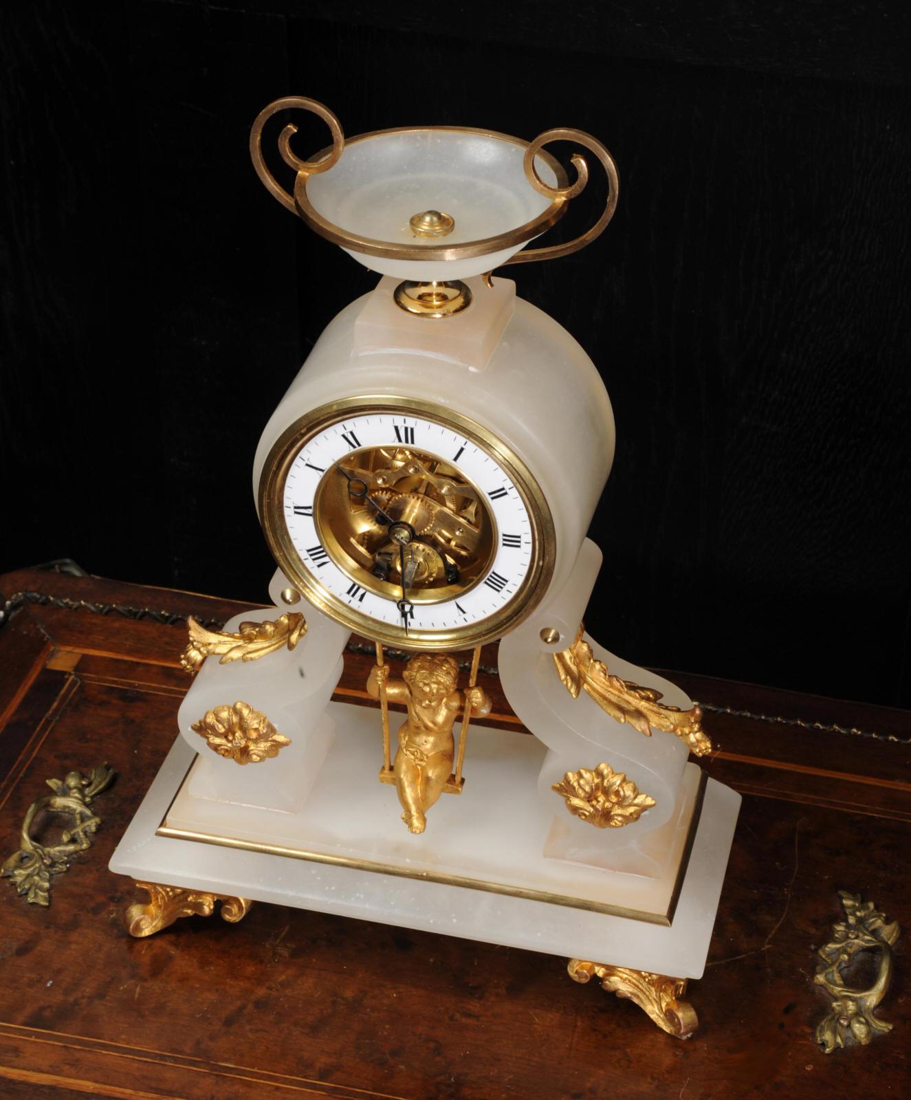 Ormolu Rare Cherub on a Swing Antique French Boudoir Clock with Visible Escapement