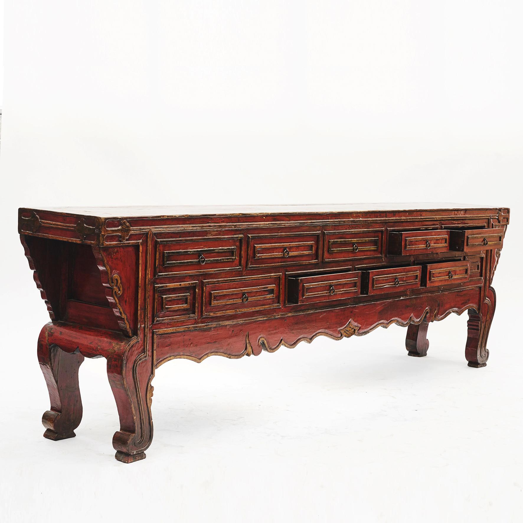 Rare large altar sideboard (size - 323 cm long).
Elm wood and original red lacquer, moldings and carvings in original yellow lacquer.
9 drawers.

Beautiful age-related patina, highlighted by a clear lacquer finish.
From Buddhist temple in