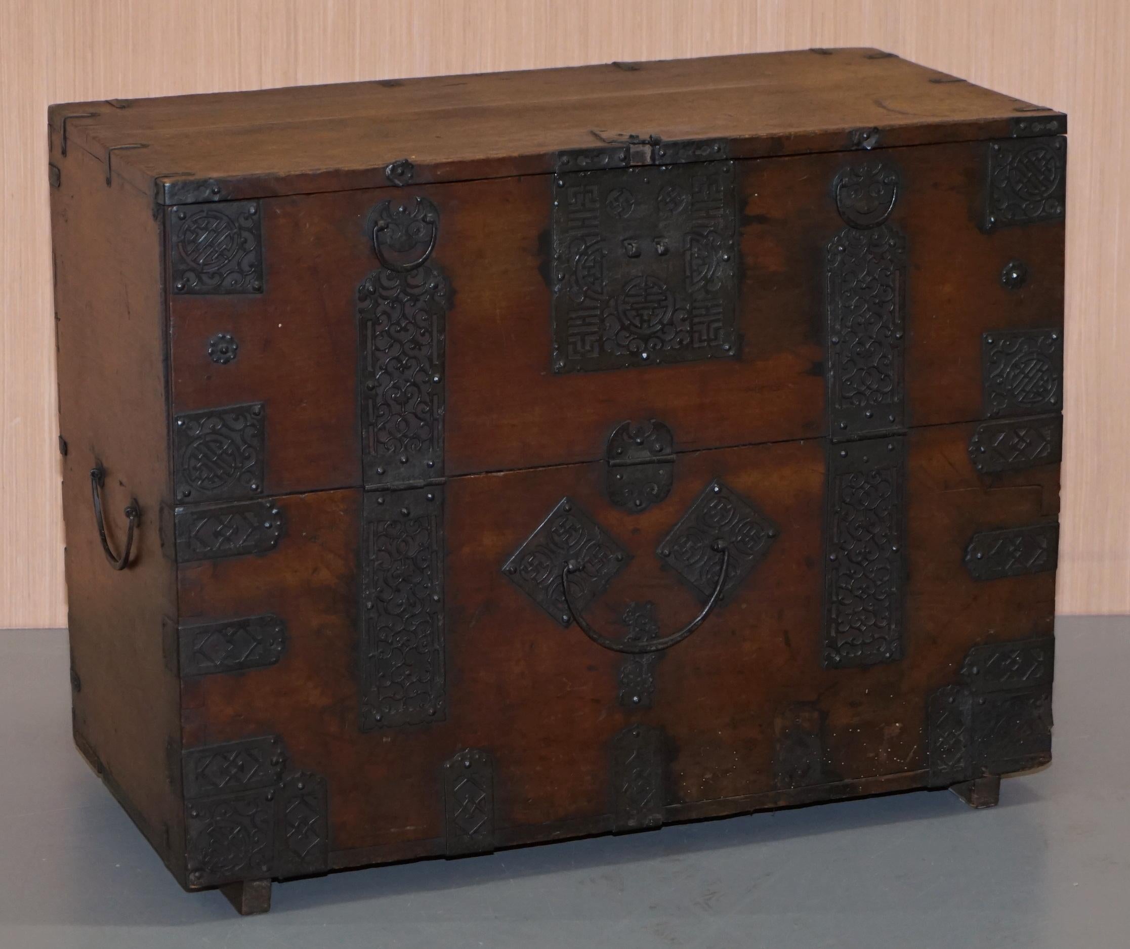 We are delighted to offer for sale this very rare circa 1840 Chinese hand carved campaign chest with ornate metal strap work depicting the Swastika

A very good looking well made and decorative piece, this is the oldest of its type that I have