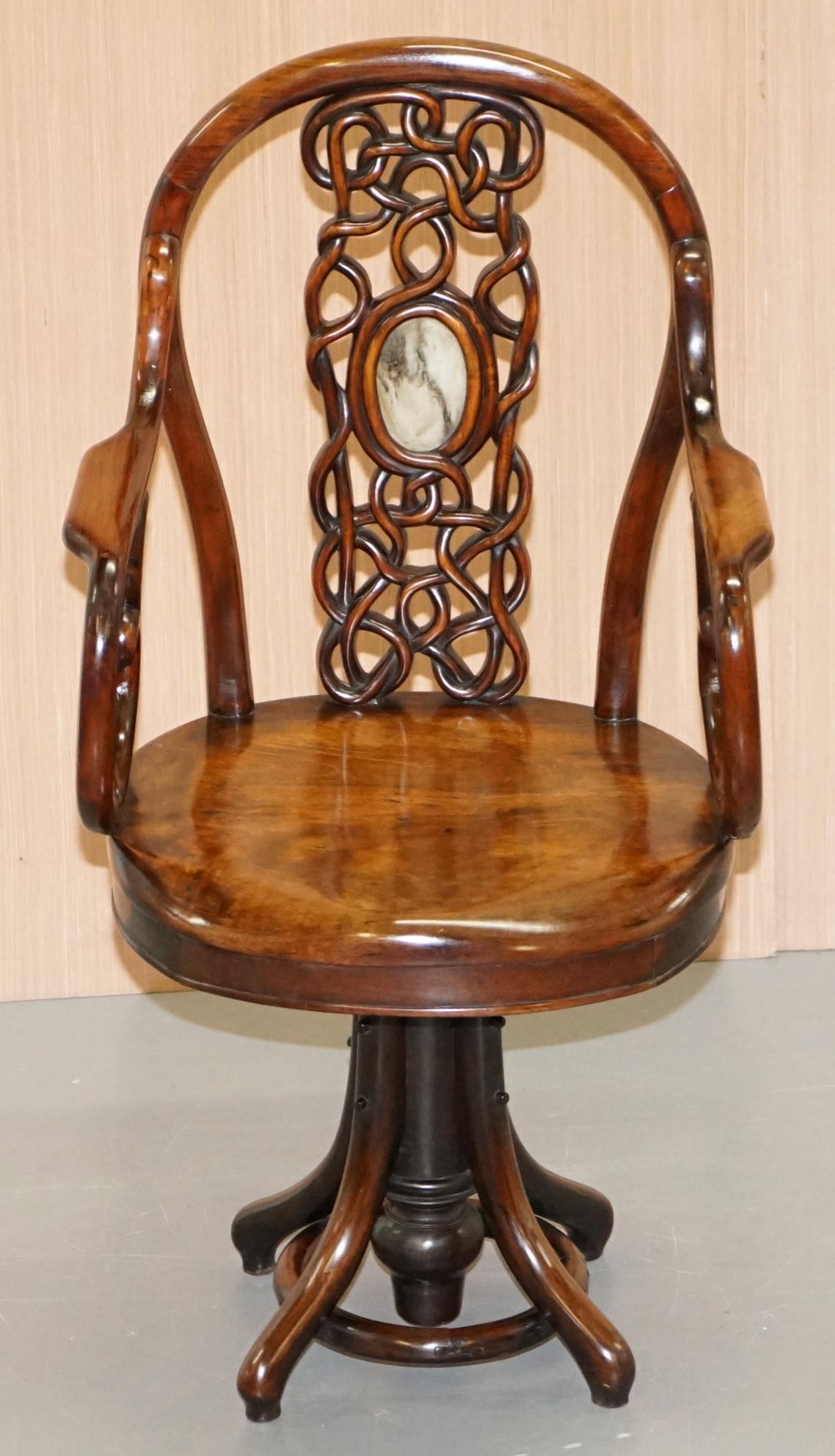 We are delighted to offer for sale this very rare fully restored Qing dynasty circa 1880 solid Rosewood with marble inset back piece fully restored captains swivel chair

A very good looking and well made chair, the timber is all solid Rosewood