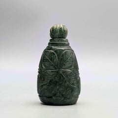 Rare Chinese Qing Dynasty Emerald Green Snuff Bottle with Carved Lotus Leaf
