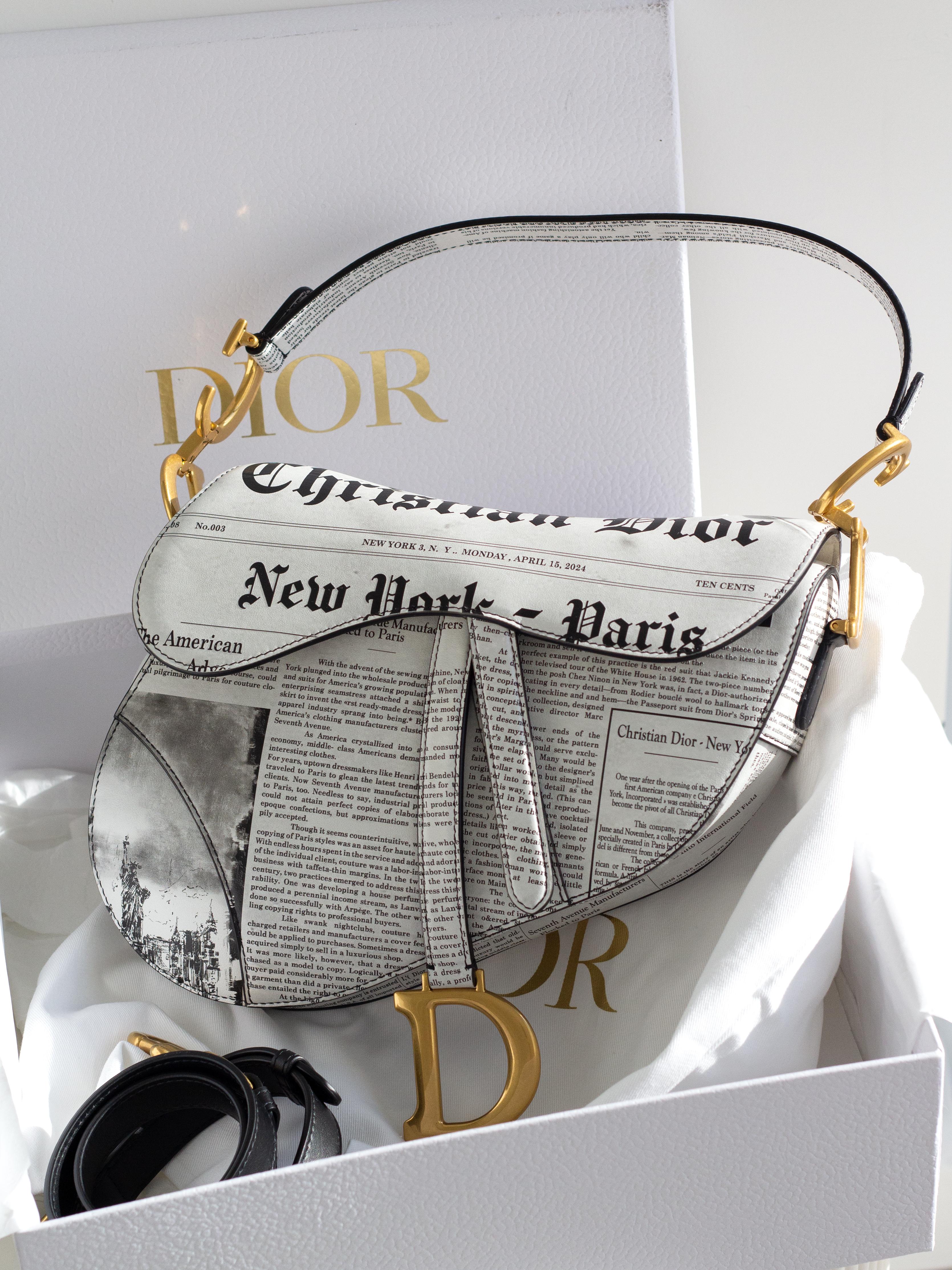 Introducing the most coveted Dior handbag of the season—super limited and sold out worldwide! This 2024 remake of the iconic John Galliano vintage newspaper saddle bag is a stunning and highly collectible piece. Crafted in luxurious calfskin, it