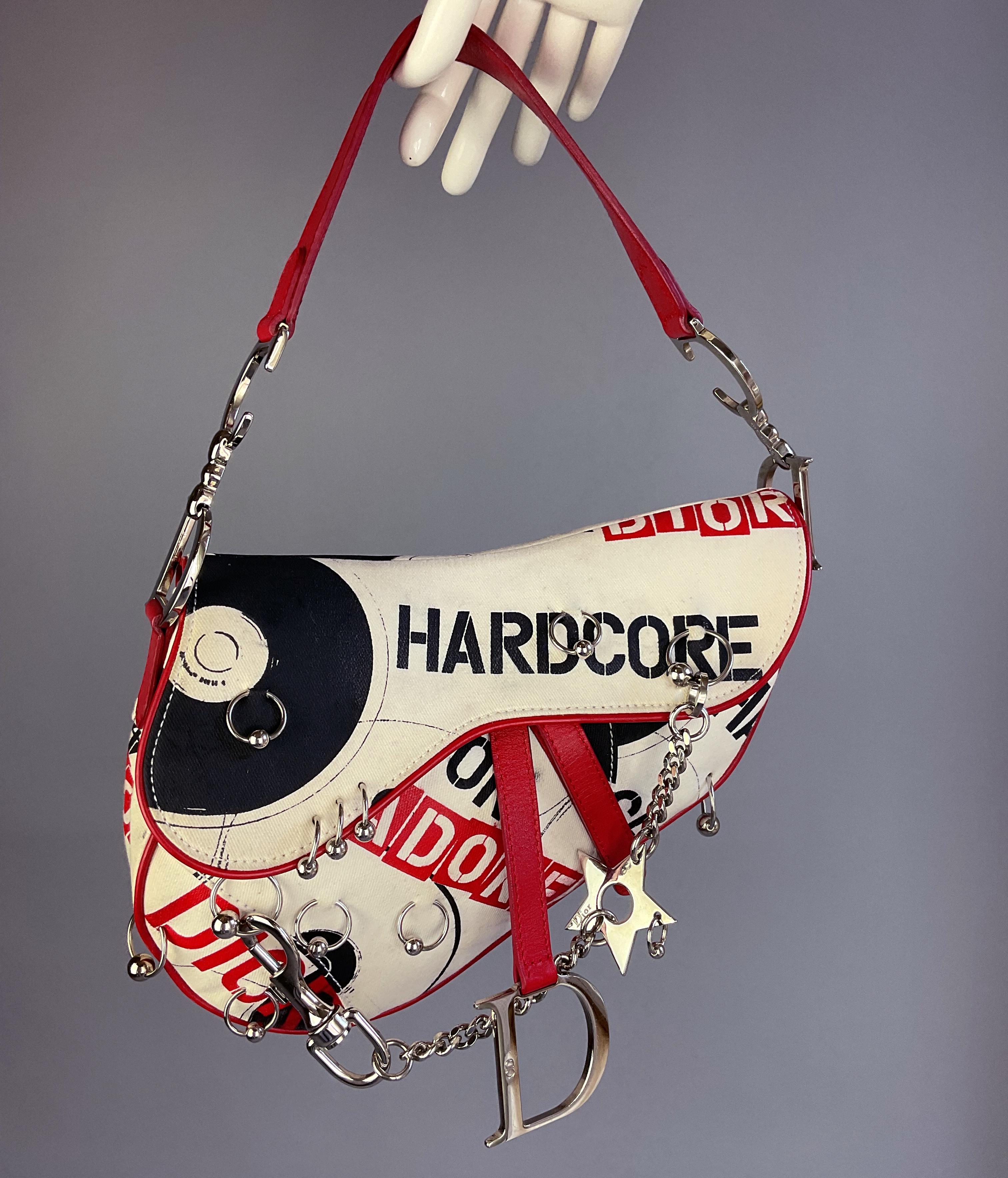 Ultra Rare Dior Hardcore Saddle Bag designed by John Galliano and manufactured for the Spring/ Summer 2004 Collection. 

Featured in many campaigns and on the runway, this is one of most extraordinary & iconic designs. 

- The bag shows normal signs