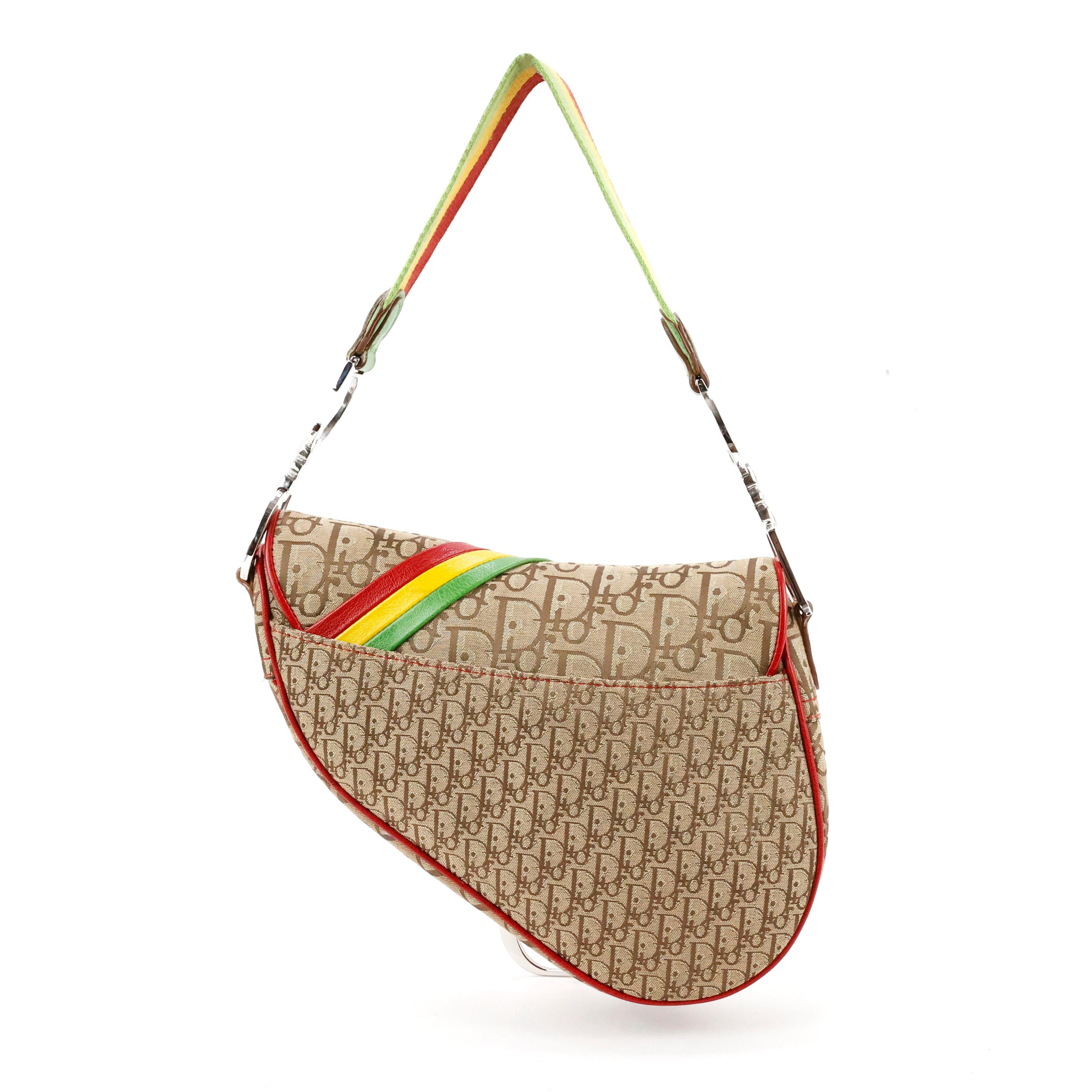 Christian Dior by John Galliano Rasta Saddle bag.

Condition:
Excellent.

Packing/accessories:
Box and dustbag.

Measurements:
24cm x 20cm x 5cm