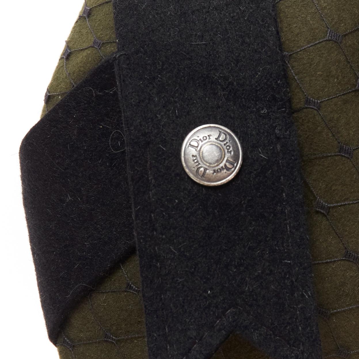 rare CHRISTIAN DIOR John Galliano 1999 Communist green wool fascinator hat
Reference: TGAS/E00026
Brand: Dior
Designer: John Galliano
Collection: SS 1999 Communist
Material: Fabric, Mesh
Color: Green, Black
Pattern: Solid
Closure: