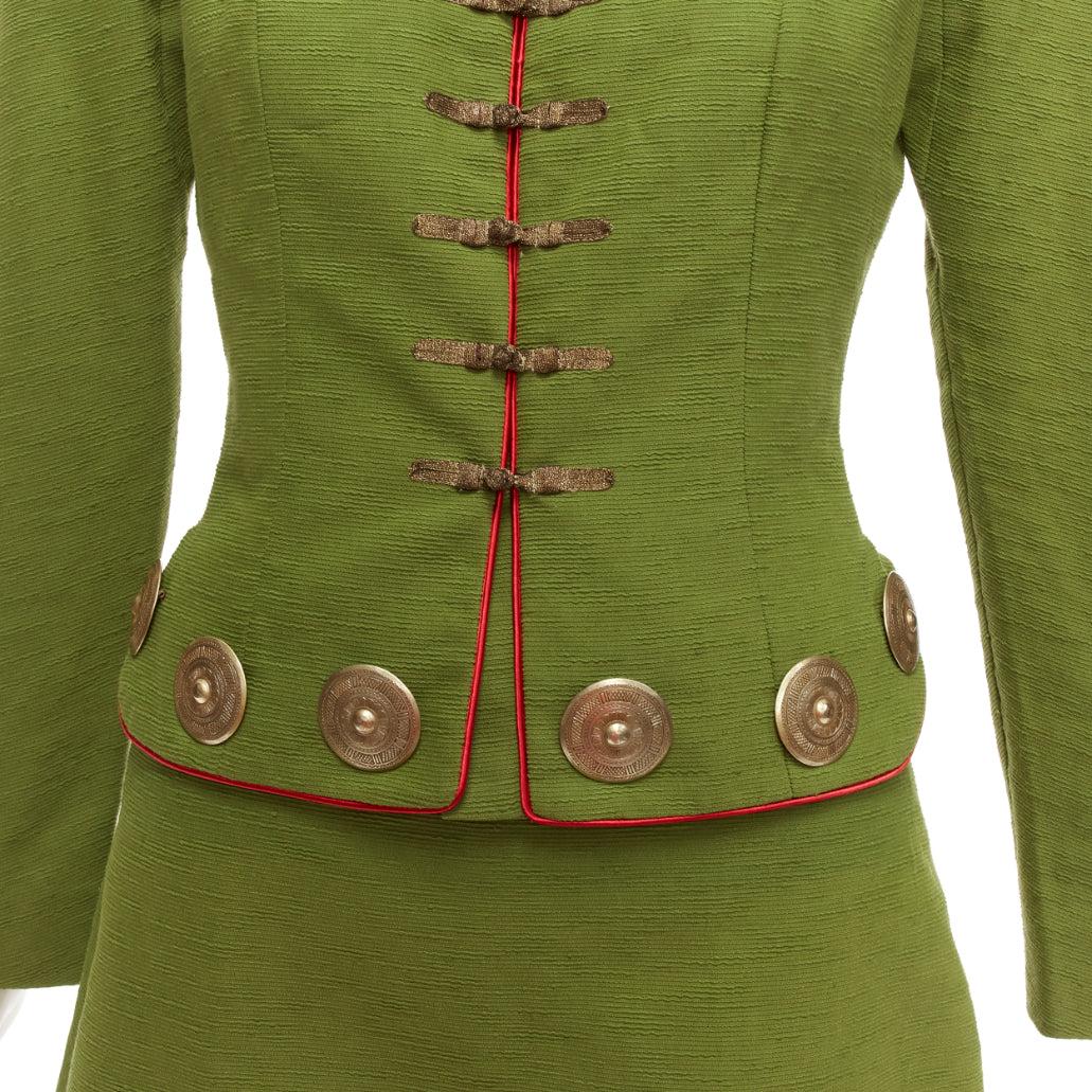 rare CHRISTIAN DIOR John Galliano 1999 Mao Communist green skirt suit FR36/38
Reference: TGAS/E00024
Brand: Dior
Designer: John Galliano
Collection: SS 1999 Communist
Material: Cotton, Blend
Color: Green, Bronze
Pattern: Solid
Closure: