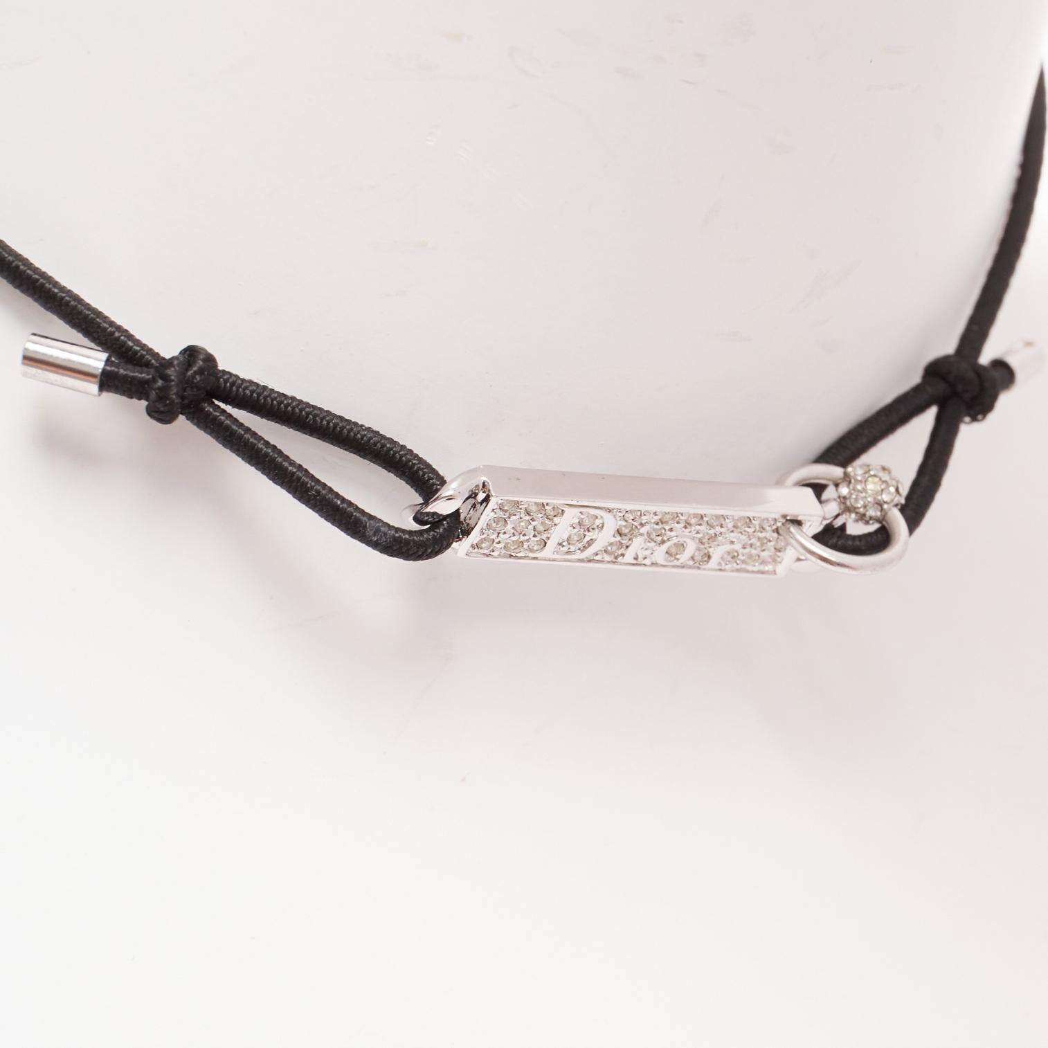 rare CHRISTIAN DIOR John Galliano Vintage silver plated crystal logo tag choker
Reference: TGAS/D01137
Brand: Dior
Designer: John Galliano
Material: Metal
Color: Silver, Black
Pattern: Crystals
Closure: Lobster Clasp
Lining: Black Fabric
Extra
