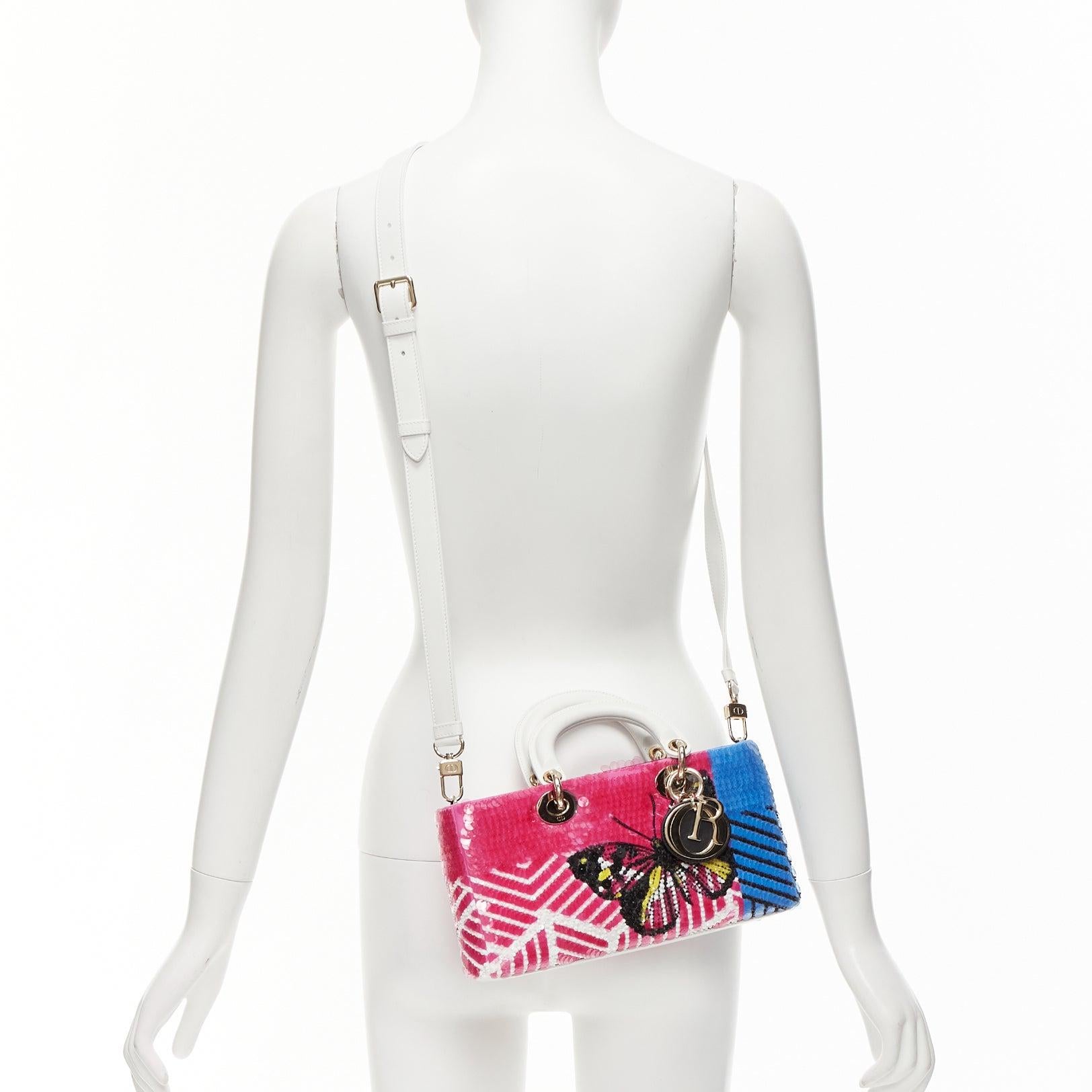 rare CHRISTIAN DIOR Lady D-joy Runway pink blue butterfly sequins crossbody bag
Reference: AAWC/A00944
Brand: Dior
Model: D-joy
Collection: 2022 SS - Runway
Material: Leather, Metal
Color: Pink, Blue
Pattern: Sequins
Closure: Flap
Lining: Black