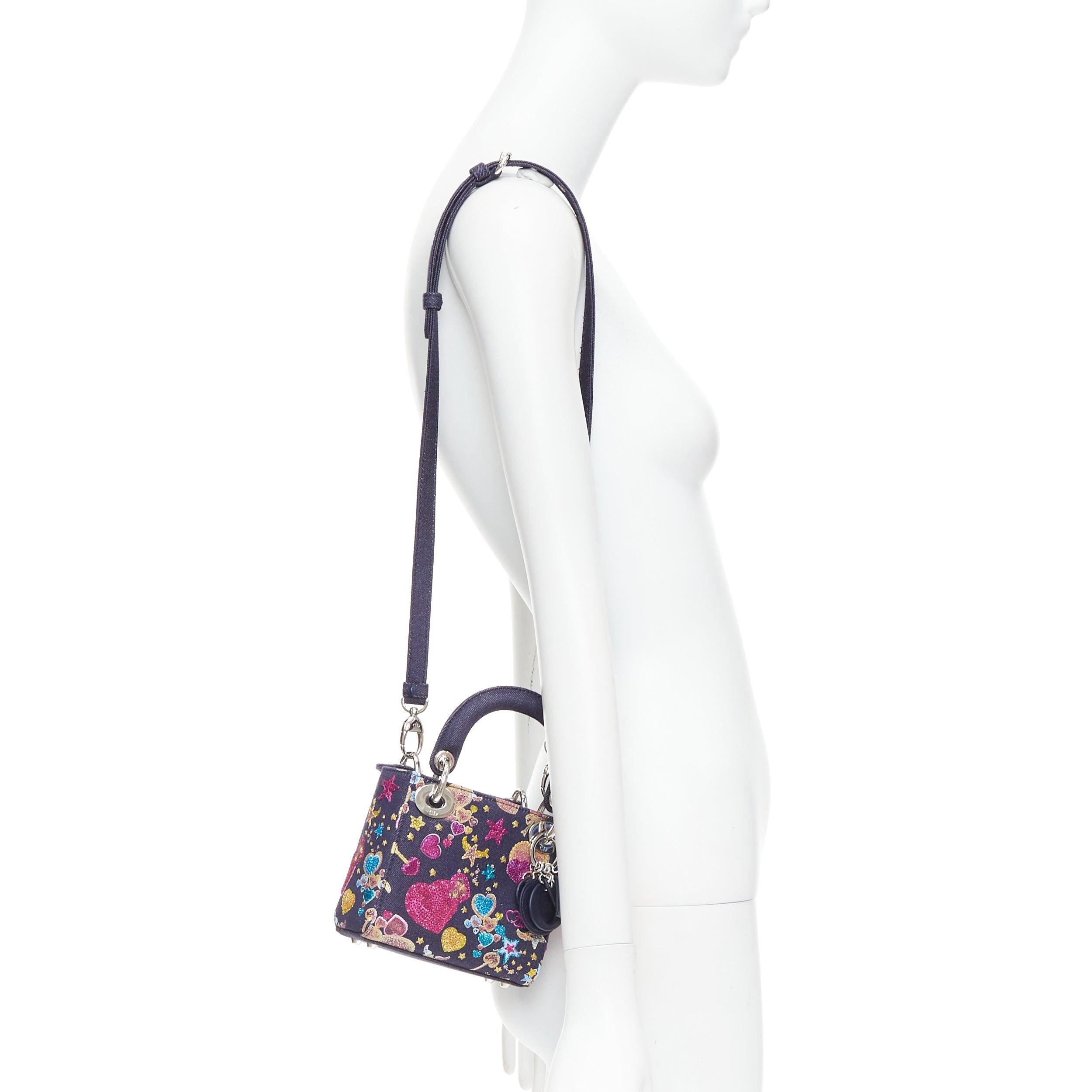 rare CHRISTIAN DIOR Lady Dior Limited edition nano blue pink denim heart tote bag
Reference: KYCG/A00165
Brand: Dior
Designer: Maria Grazia Chiuri
Model: Mini Lady Dior
Collection: Limited Edition
Material: Denim
Color: Blue, Multicolour
Pattern: