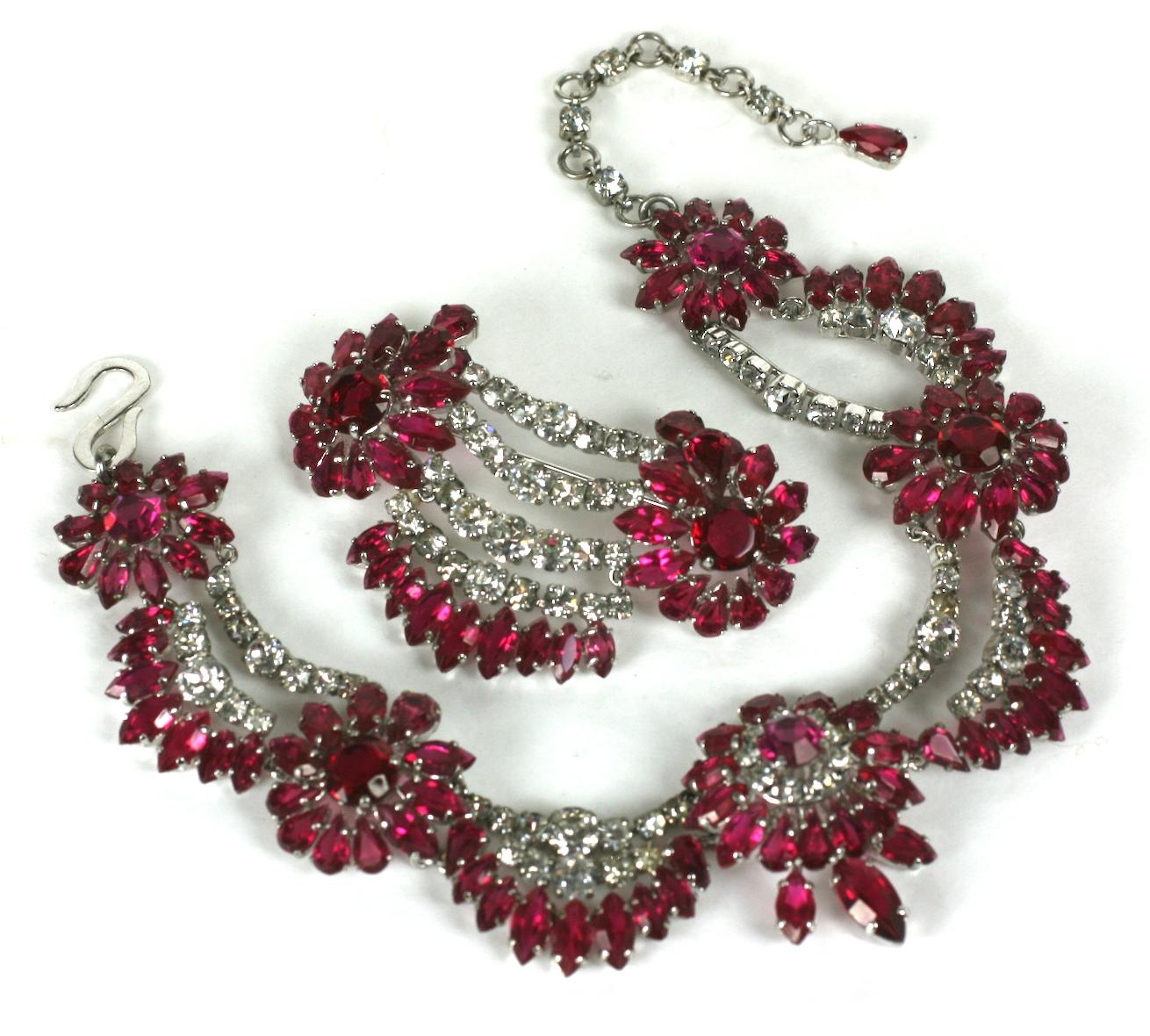 Incredibly Rare Christian Dior suite designed by Yves Saint Laurent  in 1959. Ruby and Crystal Edwardian inspired Floral swag parure consisting of a five sectioned draped adjustable choker necklace of five flower heads, an articulated brooch and