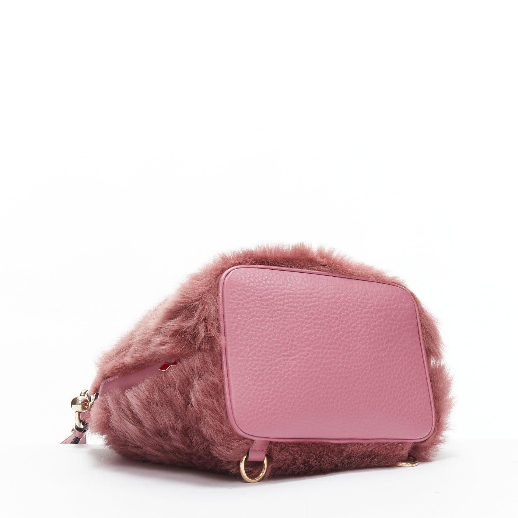 rare CHRISTIAN LOUBOUTIN Luckyl pink lamb fur 2 way shoulder bucket bag backpack For Sale 1