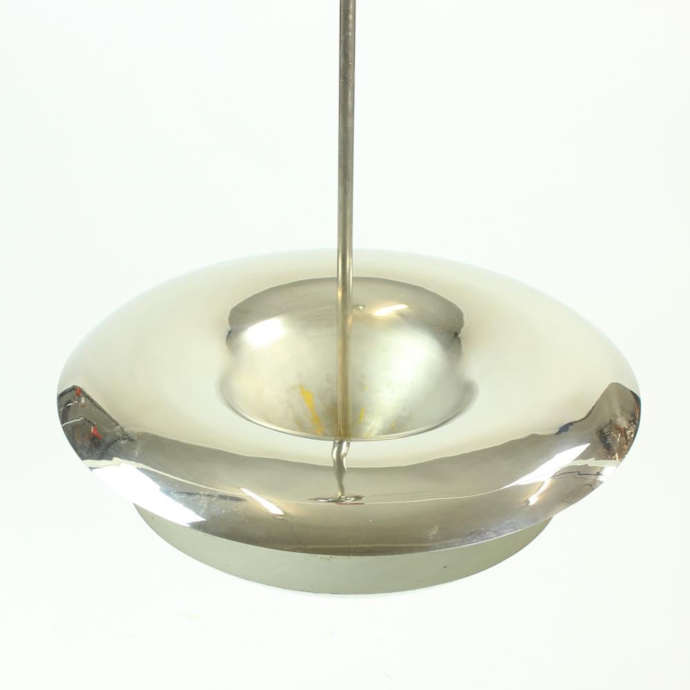 Beautiful vintage light of the Bauhaus era. Designed by Franta Anyz a Czechoslovakian architect, who after started to design lights after his return from war in 1920s. This light is fully made of metal chrome construction. Elegant shape ad typical