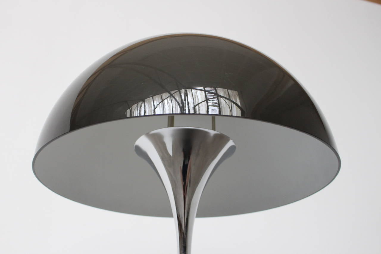 A very rare combination of chromed base and black shade Panthella table light by iconic Danish designer Verner Panton, manufactured by Louis Poulsen. Signed by the manufacturer. This is the original 1970s first edition with the on/off switch in the