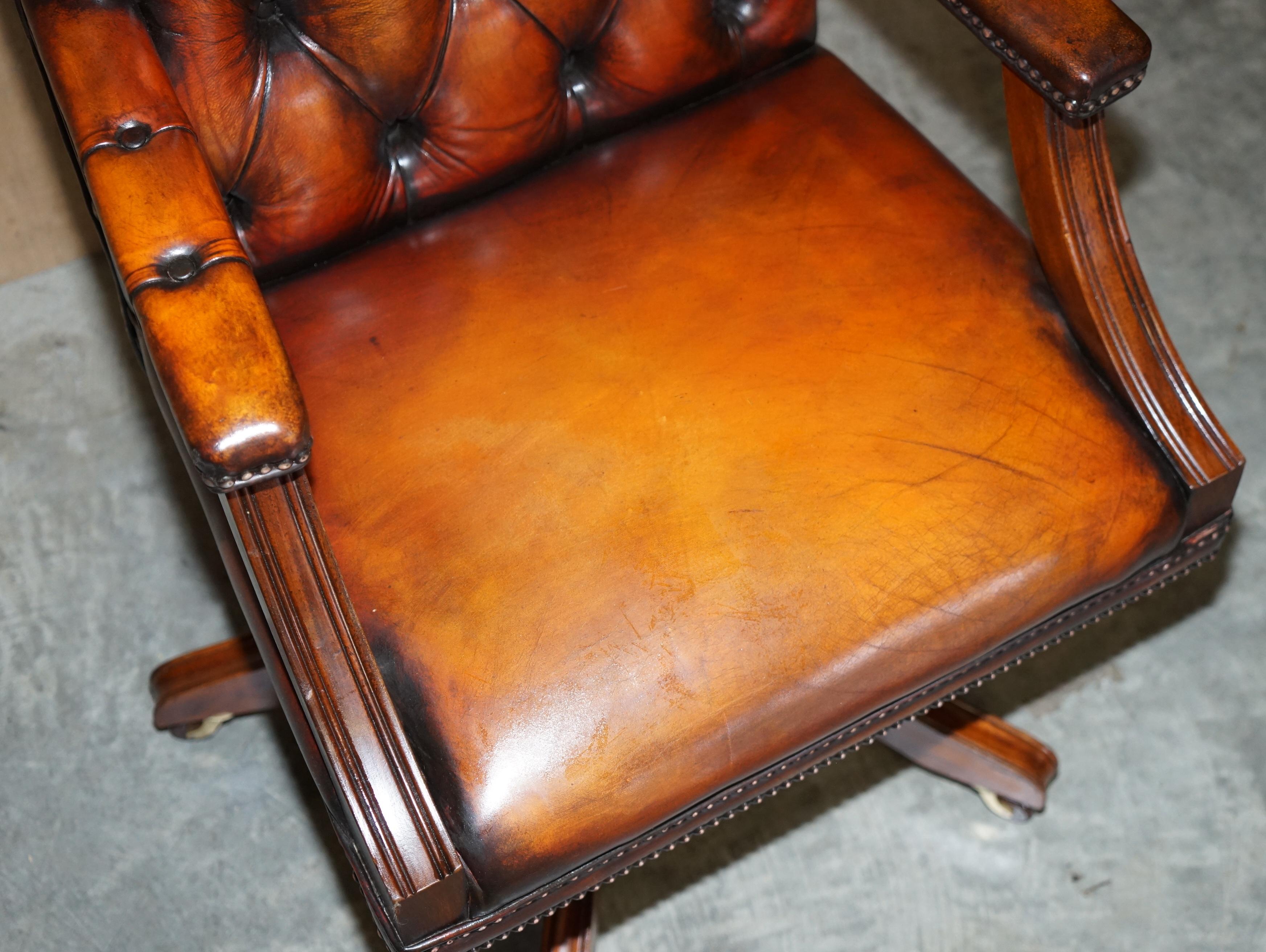 20th Century Rare Cigar Brown Leather Chesterfield Directors Captains Chair Porcelain Castors