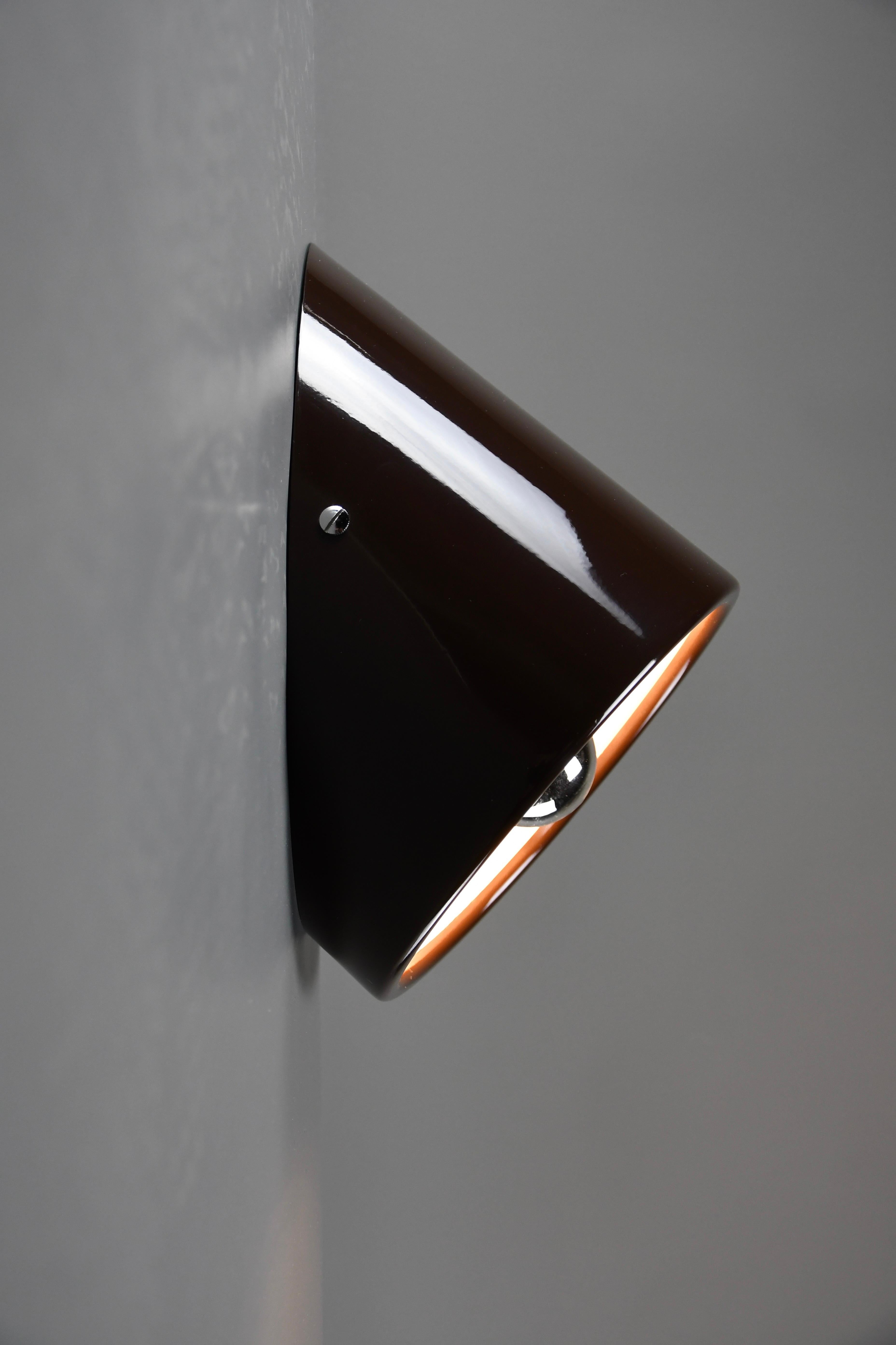 Rare Cini Boeri Model 235 Wall Light for Arteluce, Italy, 1970s

Designer: Cini Boeri
Manufacturer: Arteluce
Design Period: 1970s
Origin: Italy
Materials: Powder-coated metal
Color: Testa di Mori (Chocolate Brown)
Condition: Excellent vintage