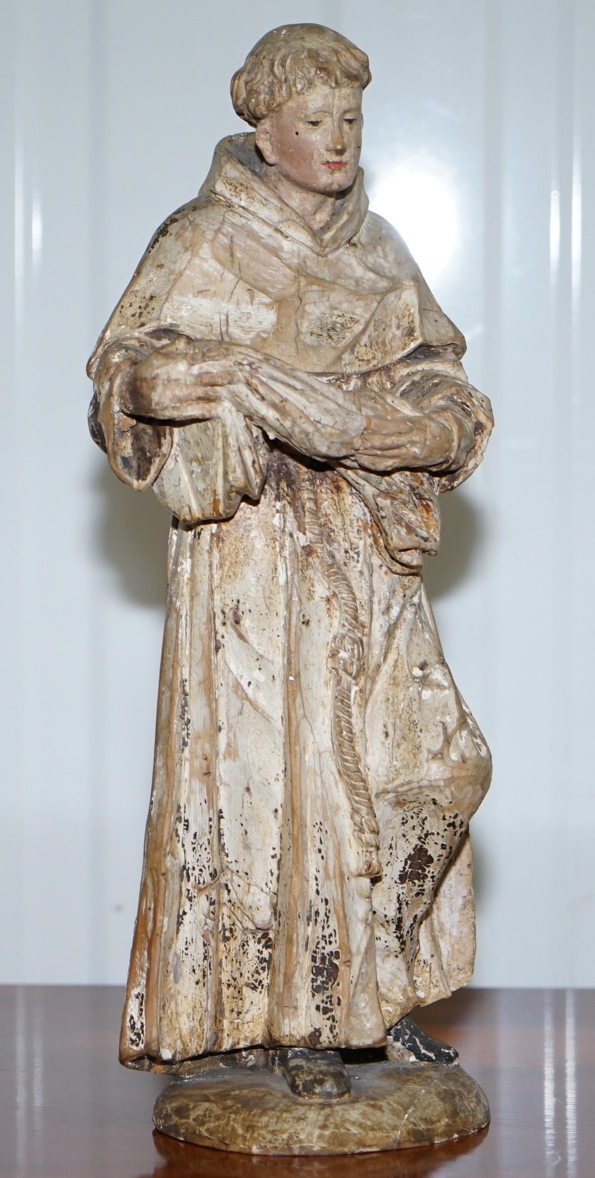 We are delighted to offer for sale this stunning circa 1800 hand carved in lime wood model of Saint Anthony of Padua

A very nicely carved highly collectable piece with traces of old paint. The look on the face is so serene, I love it, this piece