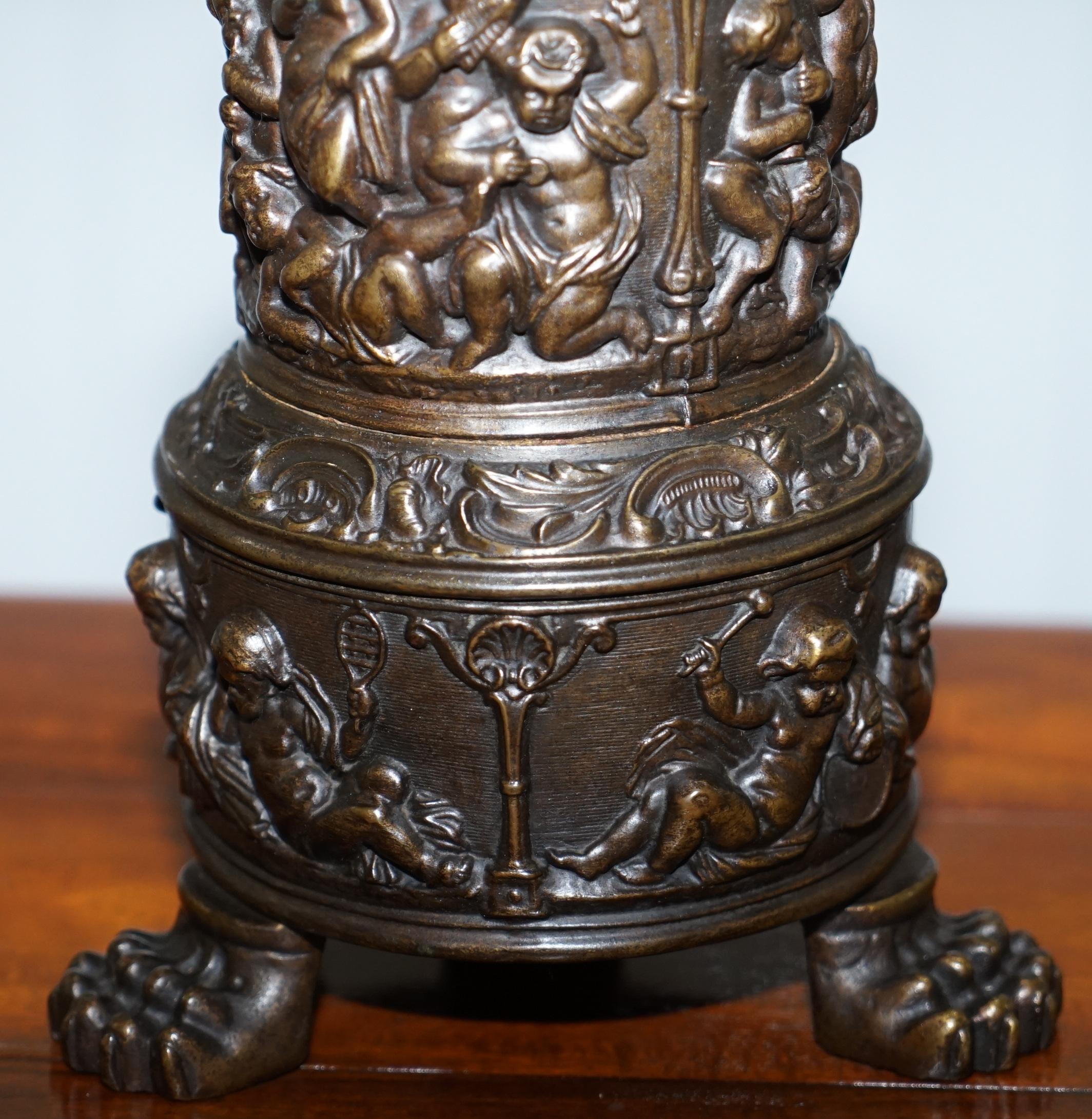 antique cherub oil lamp