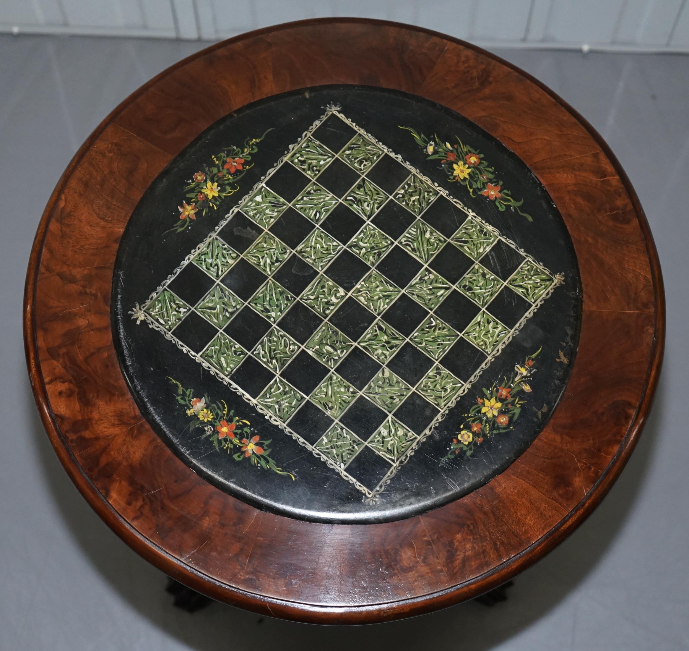 We are delighted to this very rare circa 1860 solid hand carved mahogany tripod games table depicting Griffin’s with marble Chess games board top

This table is one of a pair, the other has a Pietra Dura marble top with butterfly's which is listed