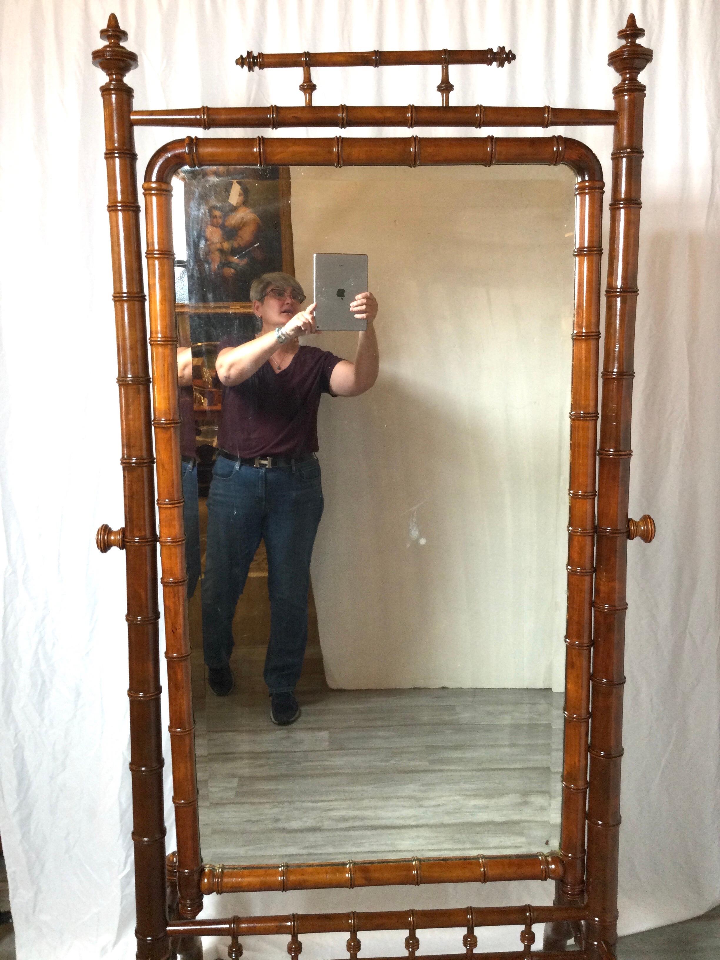 Rare Circa 1890's Late Victorian Chestnut Faux bamboo Cheval dressing mirror,
Faux carved wooden frame with original beveled mirror, some ghosting in mirror but you can easily put a new one in if so desired. Stunning look for any