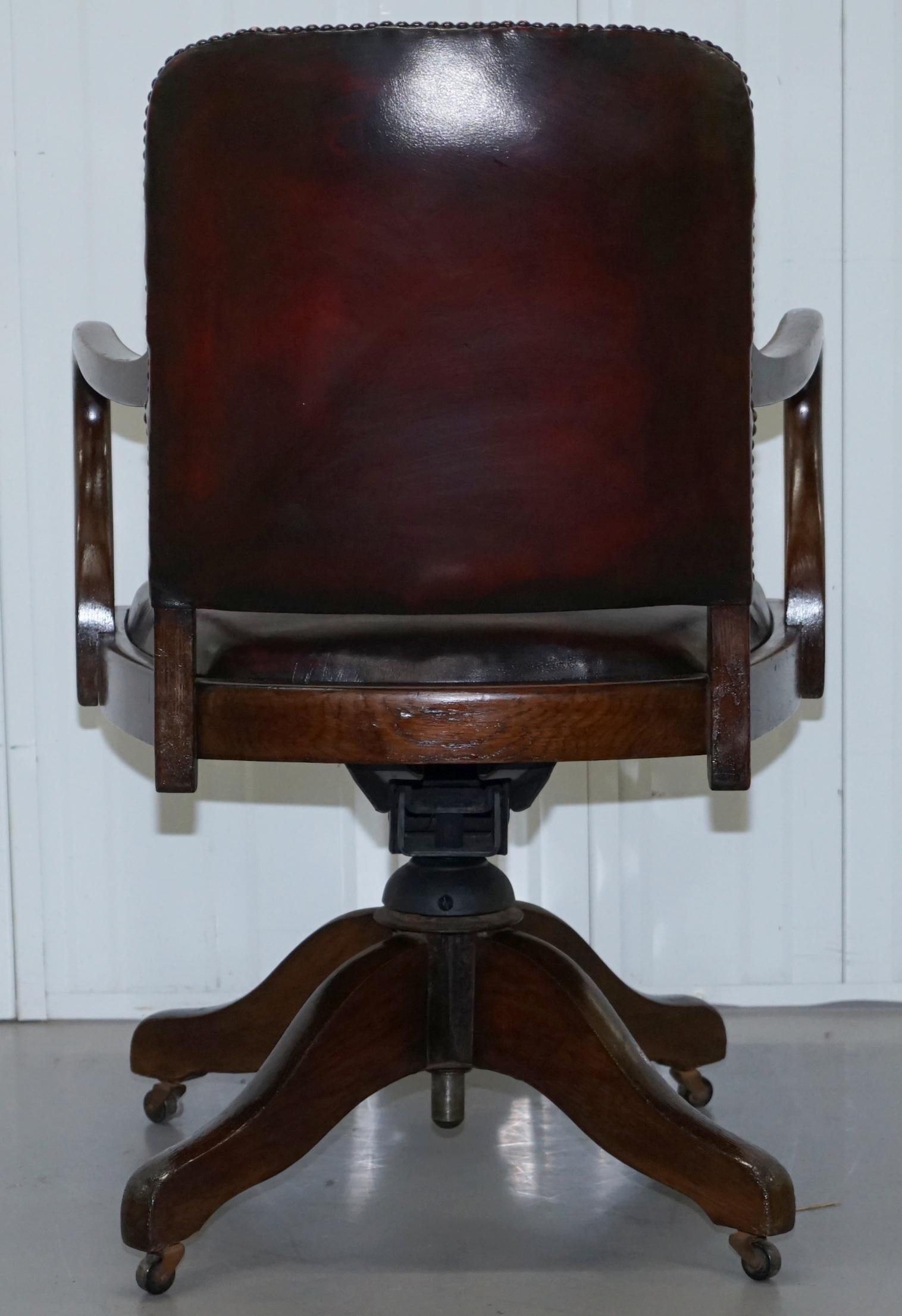 Rare circa 1910 Restored Oxblood Leather Office Captains Chair Solid Oak Frame 6