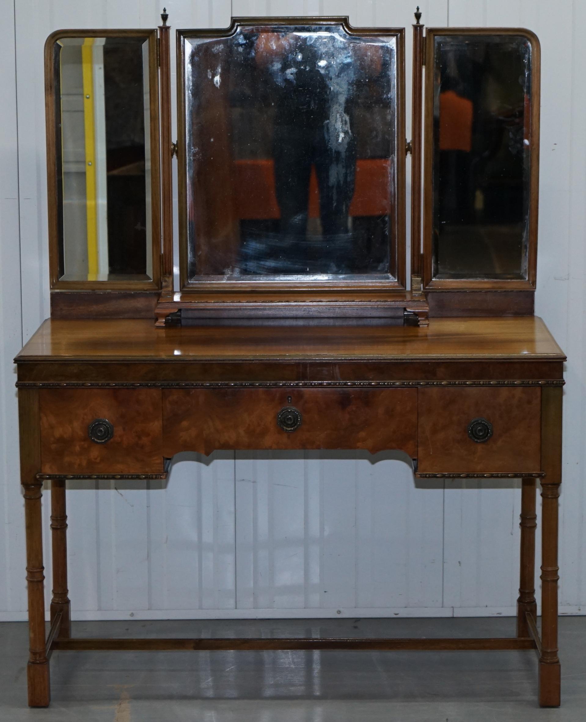 We are delighted to offer for sale this lovely hand made in England vintage 1930s burr walnut dressing table by Waring & Gillow LTD Lancaster

Made by one of if not the greatest furniture makers in British History, Gillows, this dressing table is