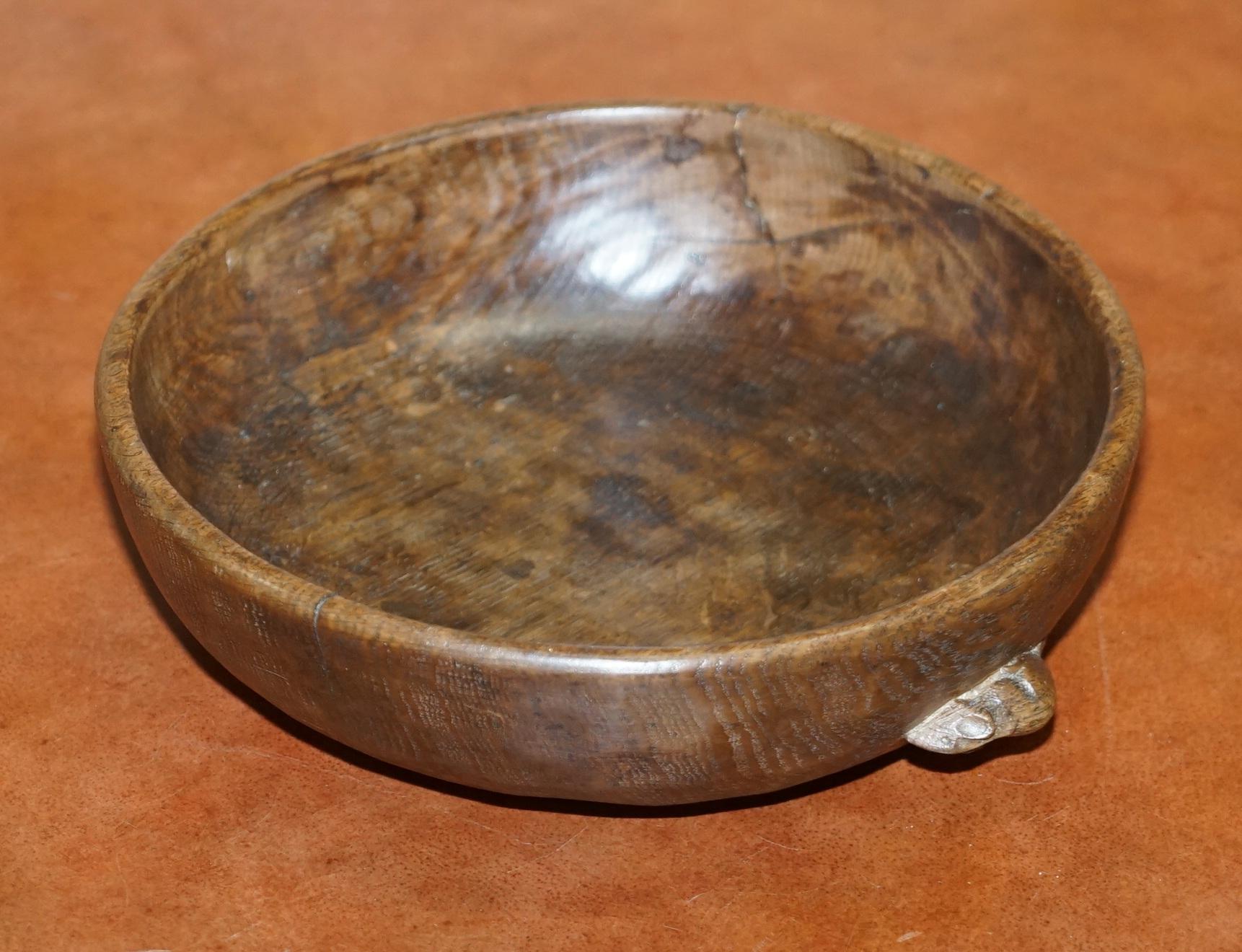 We are delighted to offer for sale this stunning original circa 1950’s Robert Thompson Mouseman Fruit or nut bowl

A stunning find, this piece has the mouse with the long tail and whiskers which means it was made within the lifetime of the great