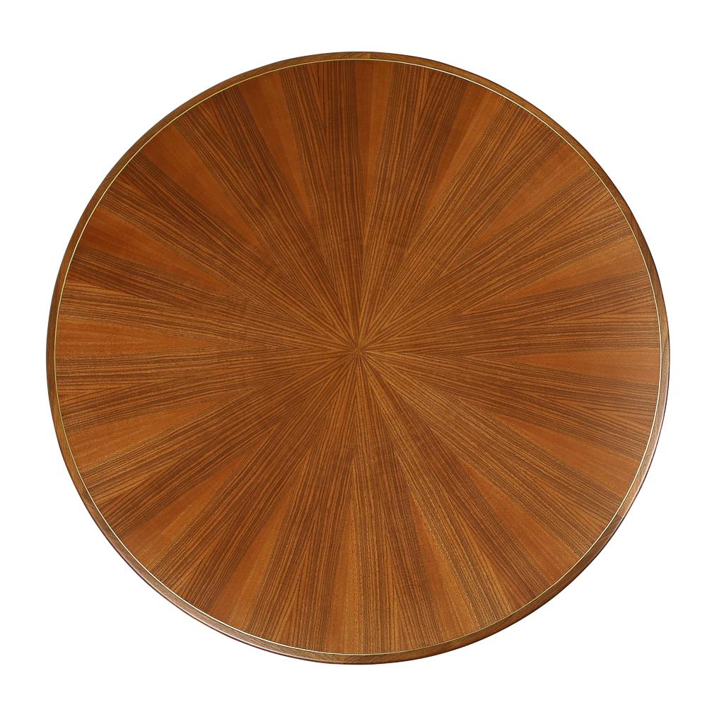 Walnut, brass. Pedestal table of 4 curved wood fronds with brass trim at feet. Solid center wood ball and radius veneered circular top with brass inlay. Produced by ABV. Published: Osvaldo Borsani – architect, designer, entrepreneur. Pgs. 271, 297,