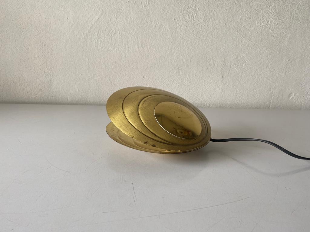 Rare Clam Shell Design brass table lamp by Angelo Brotto, 1960s, Italy

Lamp is in very good vintage condition.


This lamp works with E14 light bulb. 
Wired and suitable to use with 220V and 110V for all countries.

Measurements:
Height: 10