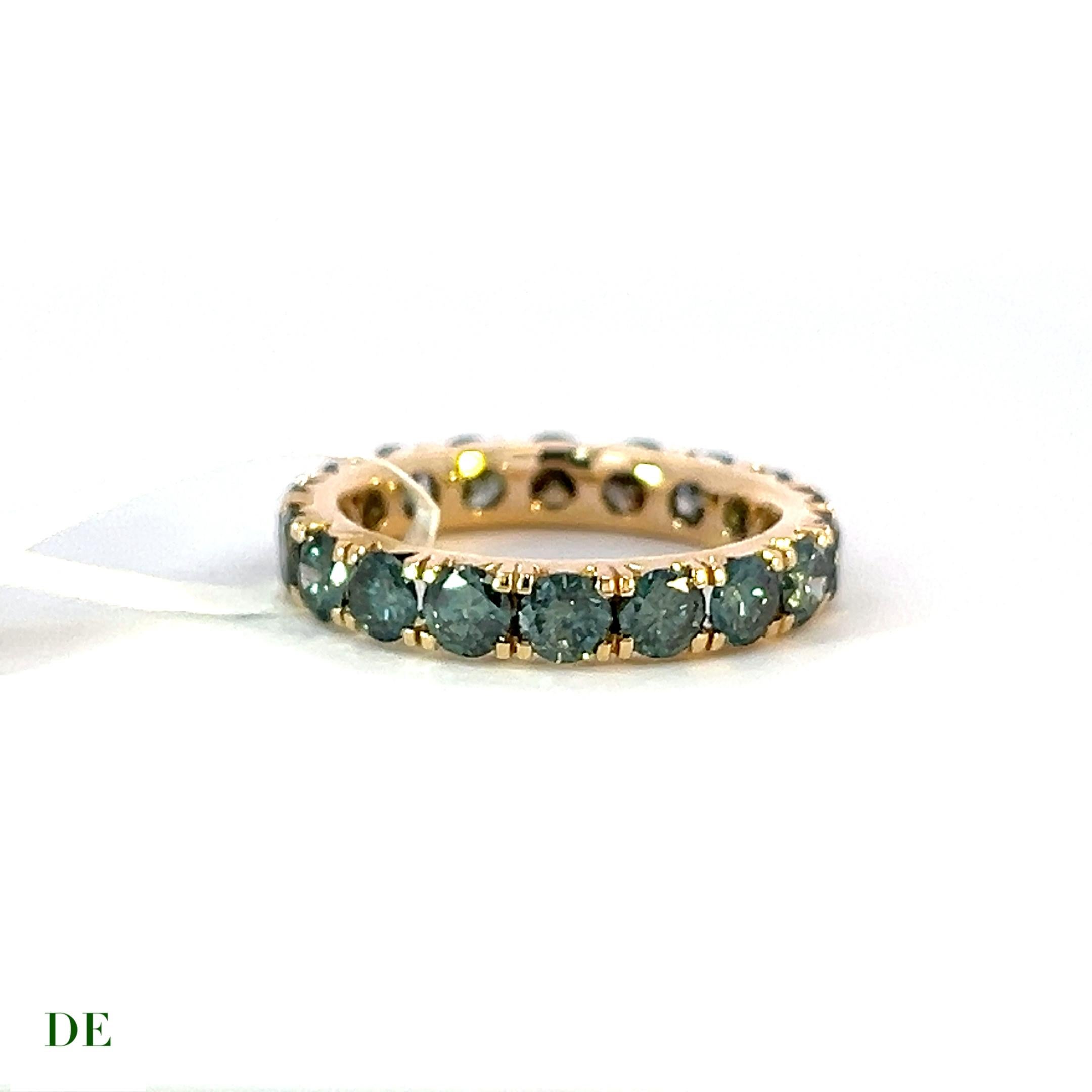 Rare Classic 14k Yellow Gold 3.02 Carat Teal Green Diamond Eternity Band Ring

Introducing the Rare Classic 14k Yellow Gold Teal Green Diamond Eternity Band Ring, a truly remarkable piece that embodies luxury and rarity. This exquisite ring features