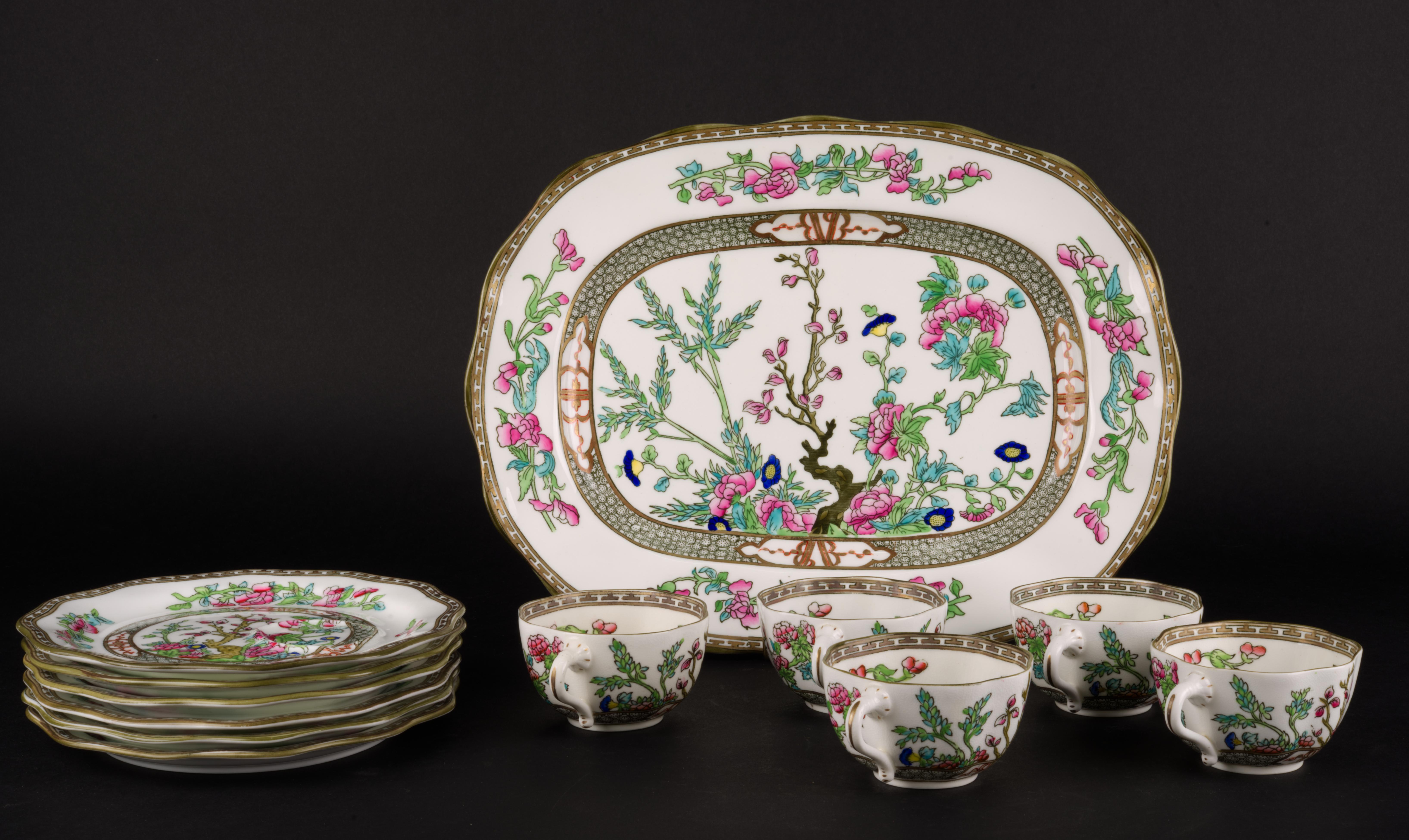 
Set of 5 dessert plates and cups and large rectangular serving or sandwich platter was made of fine porcelain by Coalport China Company in England. It is hand decorated with Indian Tree pattern; despite its name, Indian Tree pattern is based on
