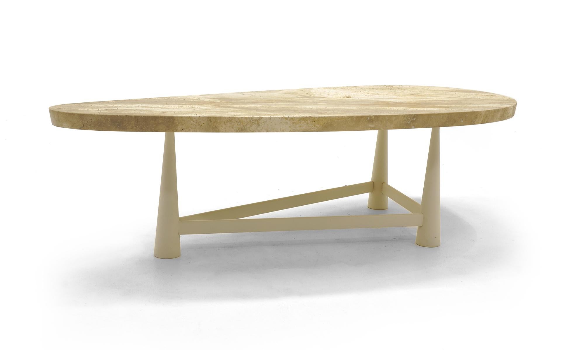 Rare, original coffee table by Edward Wormley's for Dunbar. The model 521 features a 1.75 inch thick travertine top with openings on the underside for secure, perfect placement on the base every time. The base is made of lacquered aluminum in the