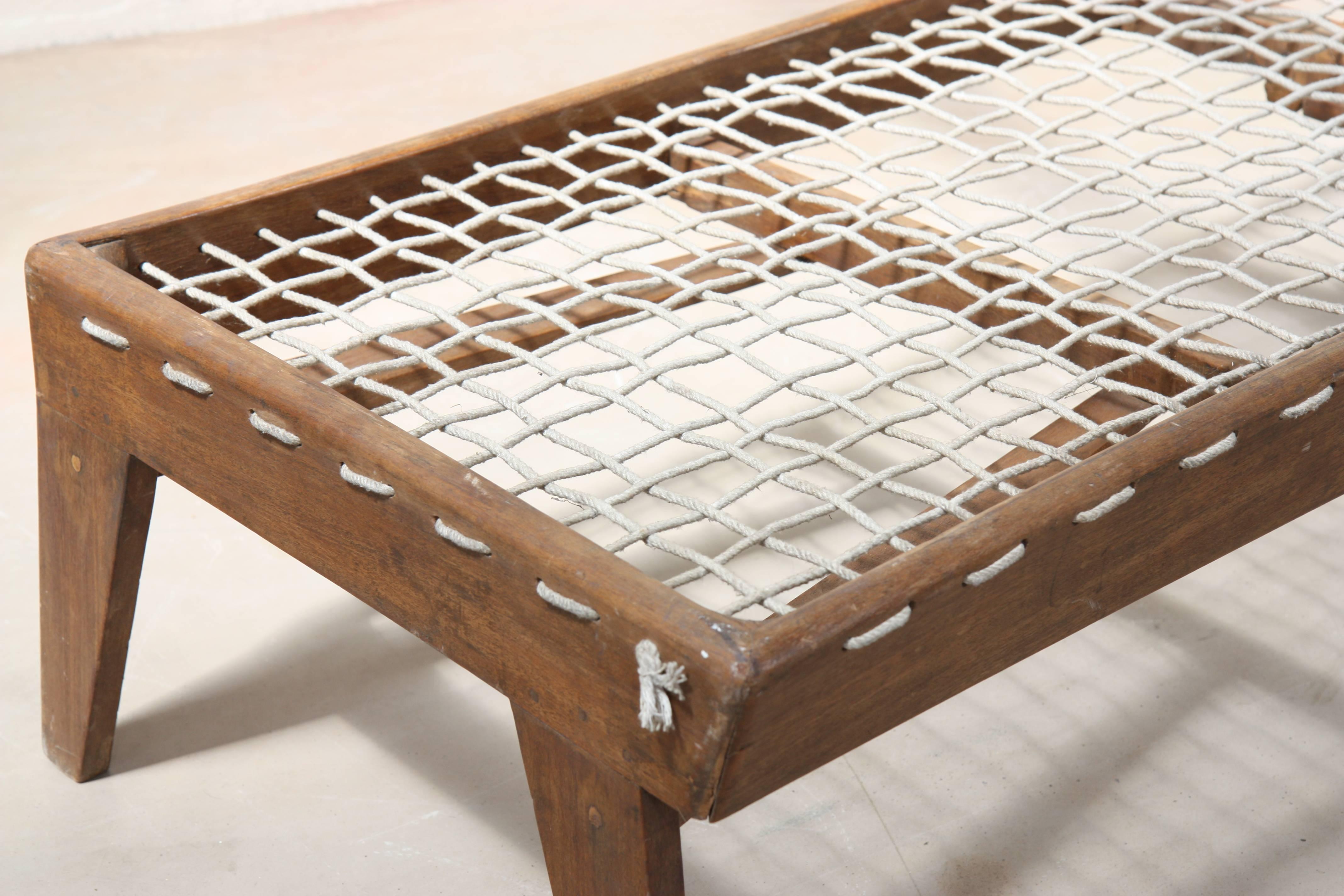 Rare coffee table by Pierre Jeanneret (1896-1967). In teak, resting on four feet of type 