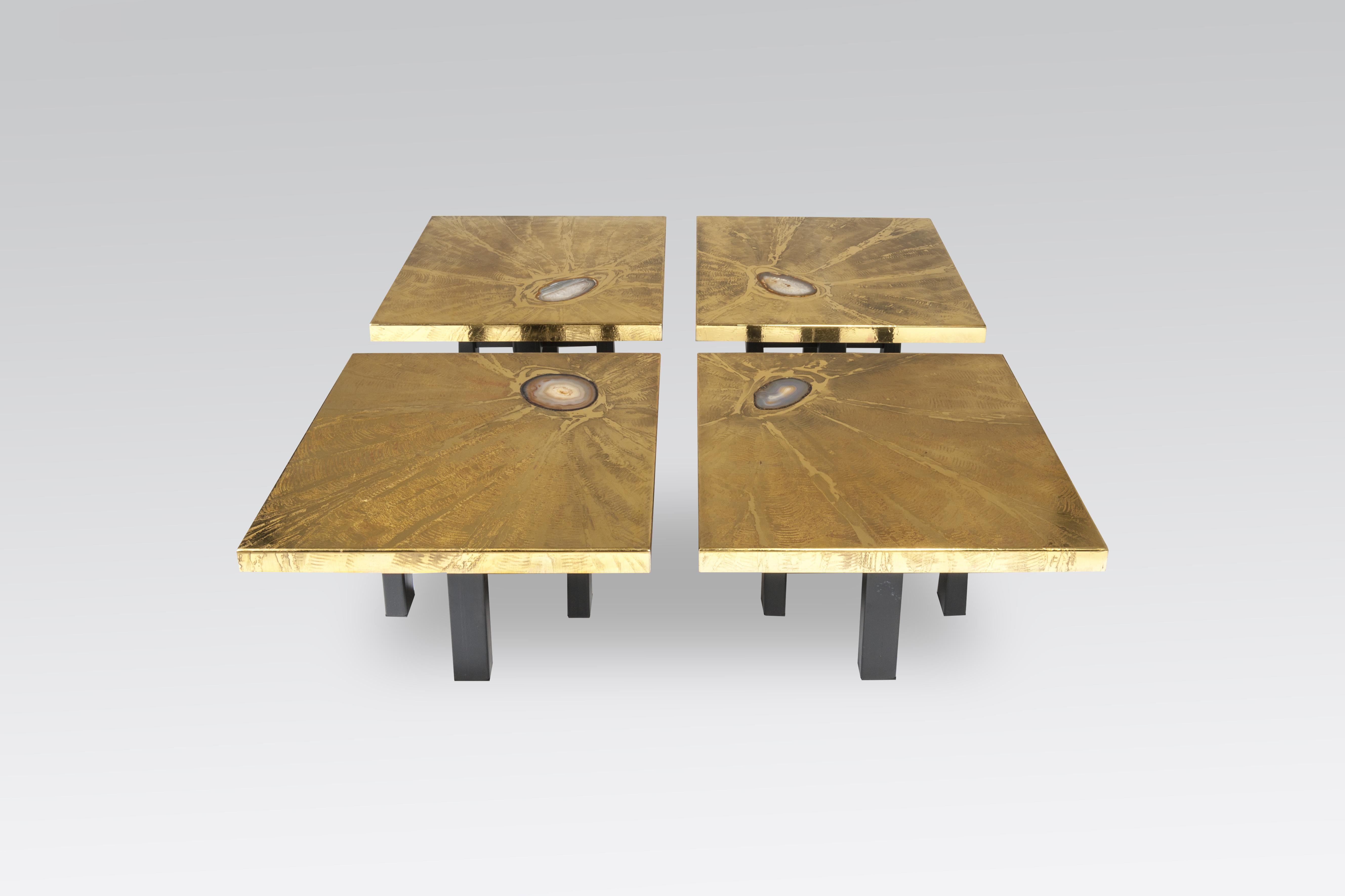 This coffee table by Lova creation, is a set of four side tables in etched brass inlaid agates gemstones, signed by the artist, circa 1980.

Dimensions: 60 x 60 x 35cm each side tables
120 x 120 x 35cm.
 