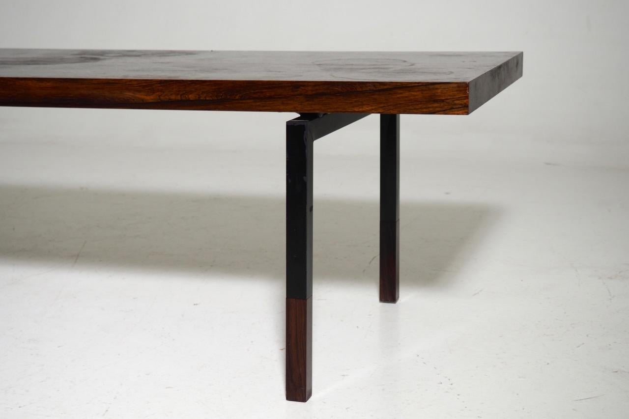 Rare coffee table in massive rosewood (palisander), legs in steel and rosewood. Made by a Danish architect in the 1960.
Measures: H. 48, L. 165, D. 60.5 cm.
H. 18.8, L. 64.9, D. 23.8 in.