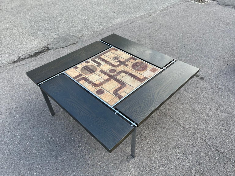 Wonderful ceramic tile, wood and stainless steel coffee table by Svend Aage Jessen & Sejer Pottery for Ryesberg Møbler, 1970s, signed by Sejer Keramik, in great condition.